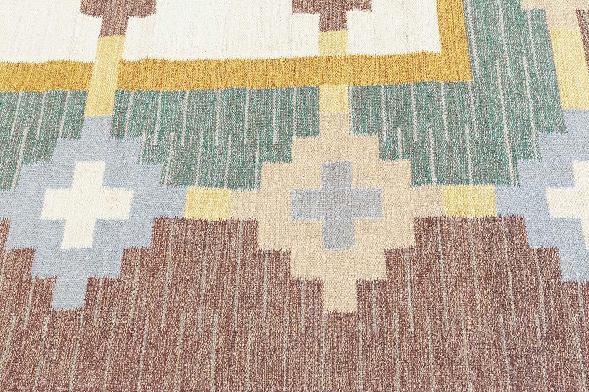 Midcentury Swedish geometric brown, green flat-weave rug. Woven signature to edge 'GS'
Size: 5'10