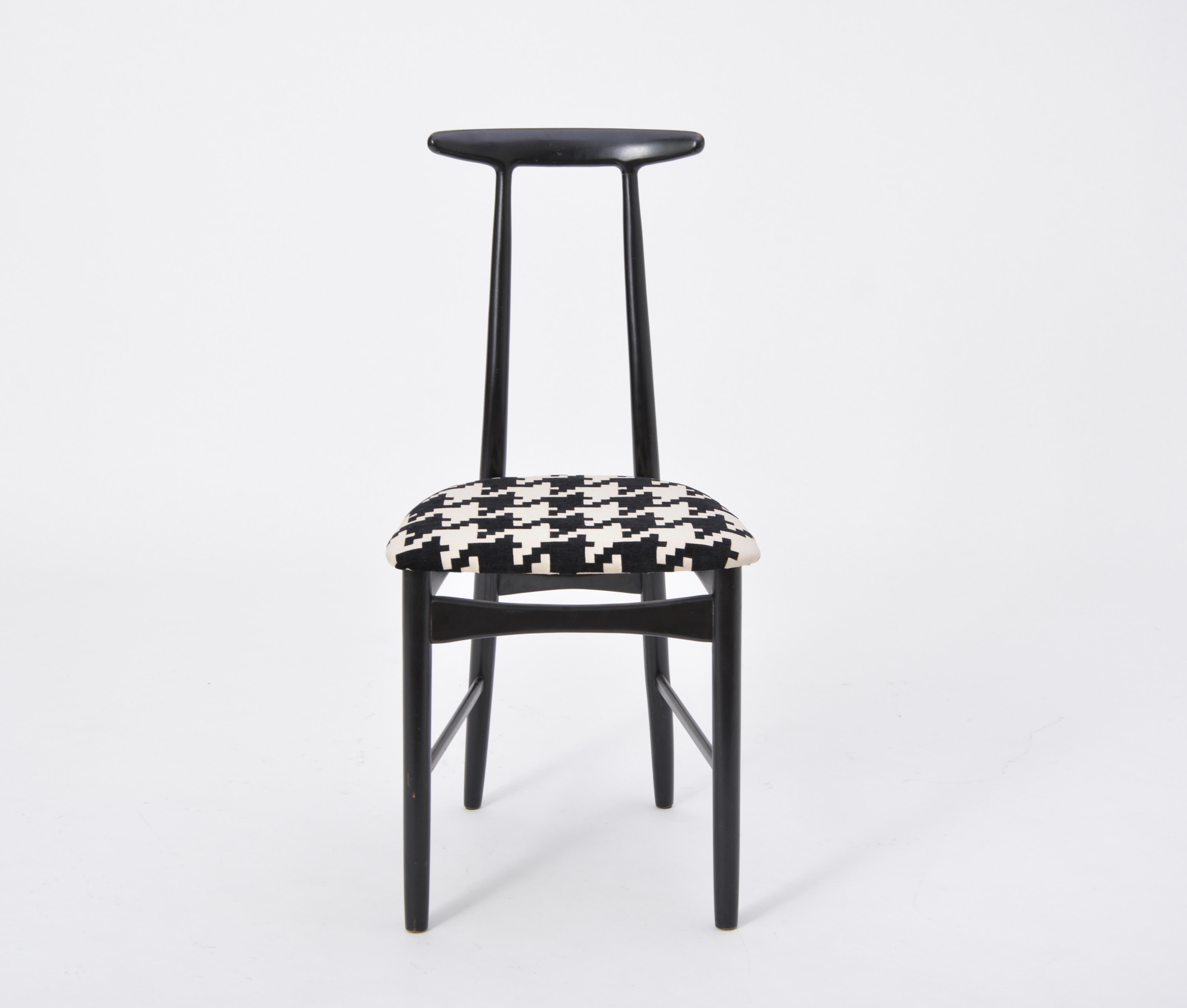 Swedish Mid-Century Modern chair by Gemla Diö

This chair was produced by Gemla Diö in Sweden, circa the 1950s. The frame is made of black-lacquered wood and the chair has been newly reupholstered.