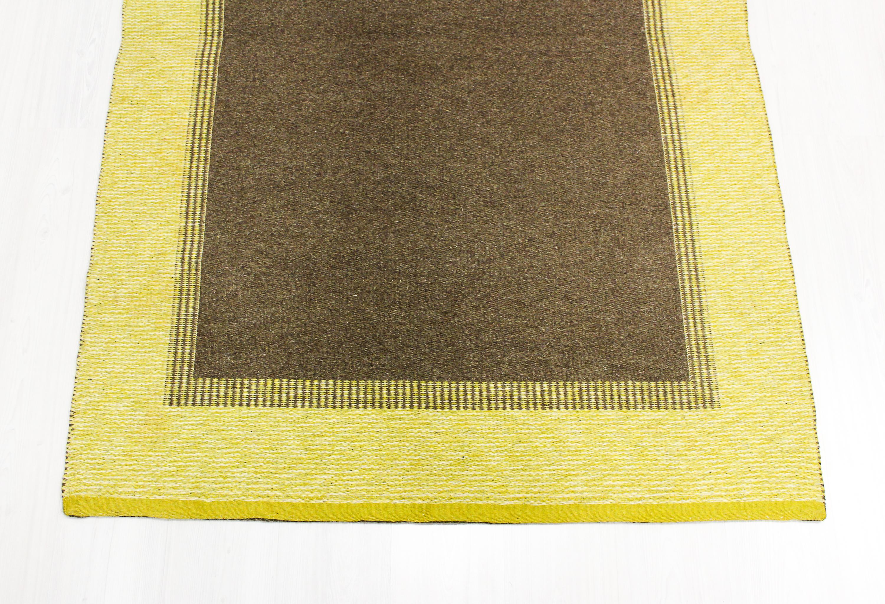 A midcentury Swedish flat-weave carpet by unknown designer. The carpet is made with double weave technique which and can therefore be used with both sides up. Very good vintage condition but there is one stain on one side that doesn't show on the
