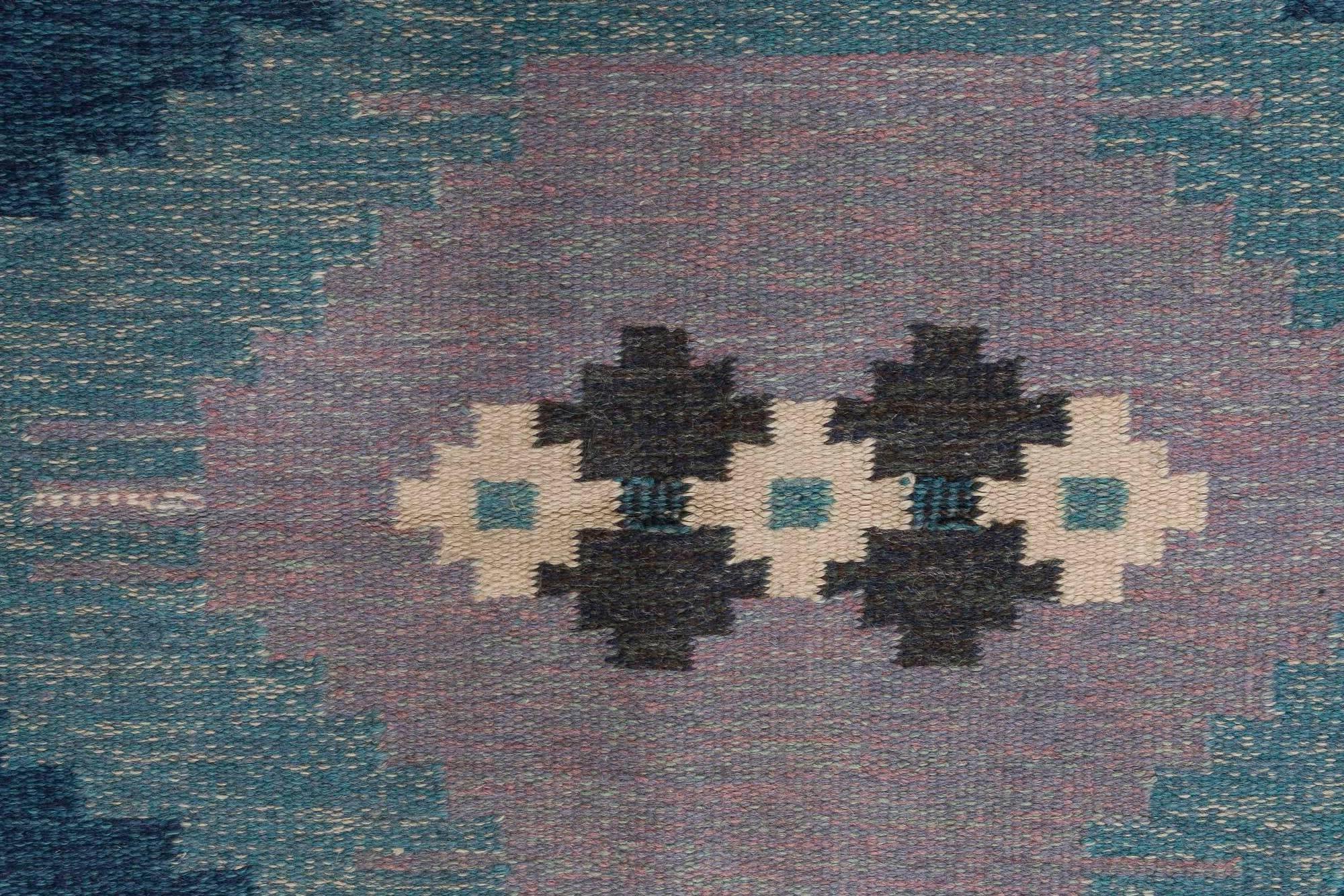Mid-20th century Swedish geometric blue flat-woven wool rug signed by Ingegerd Silow at Doris Leslie Blau
Size: 4'5