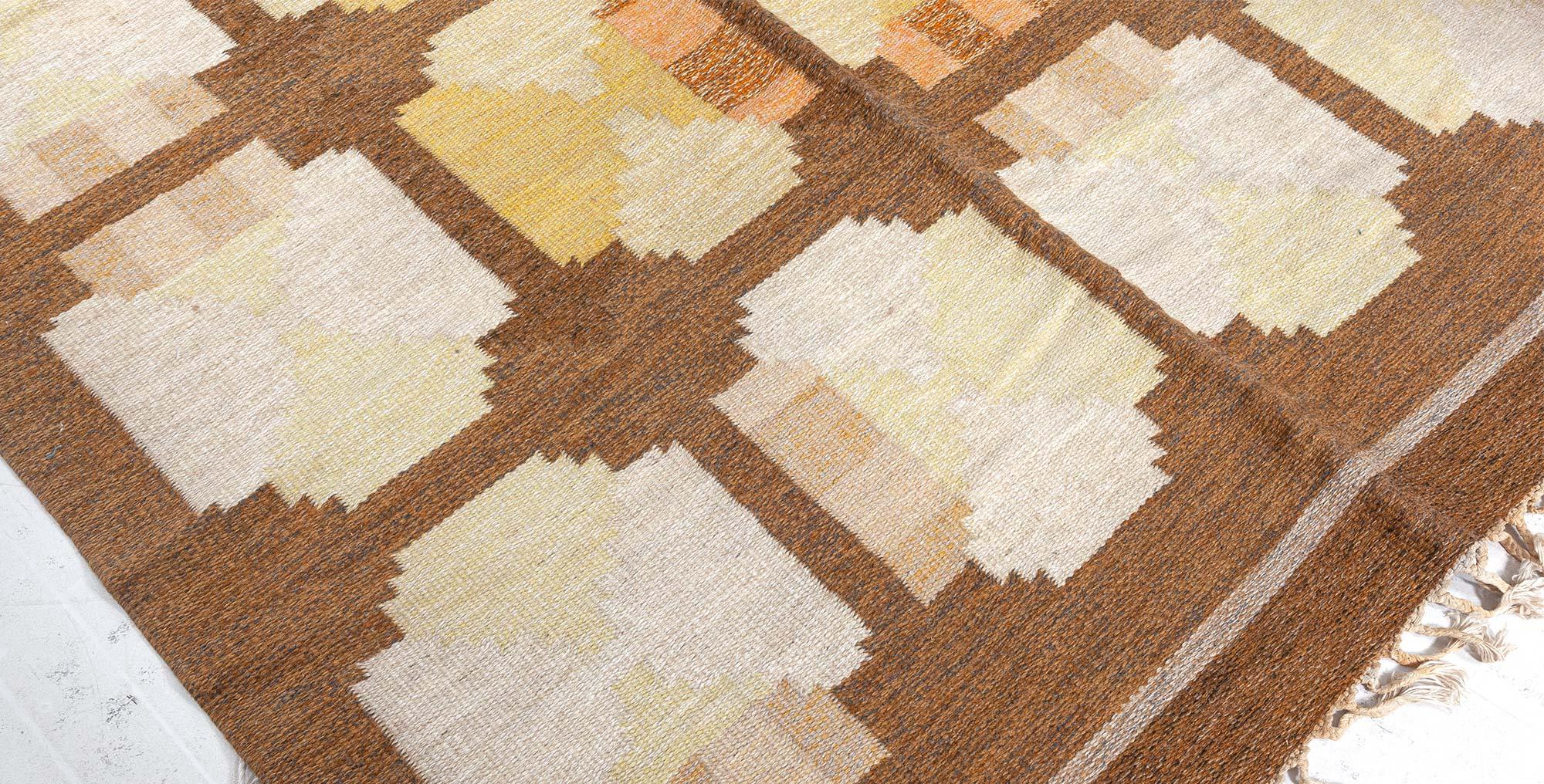 Mid-20th century Swedish Geometric yellow, orange and brown flat-weave wool rug
Size: 6'5