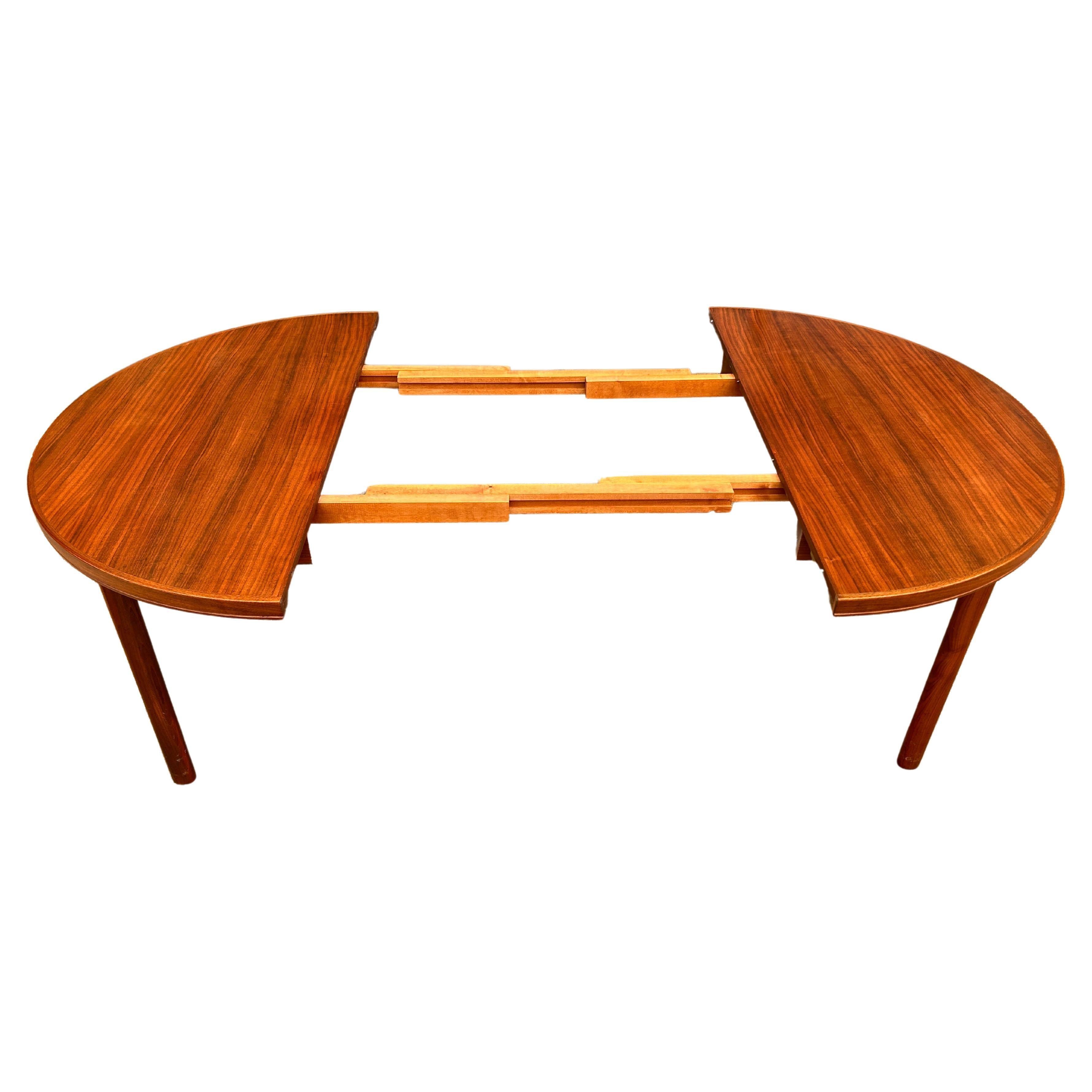 Mid-20th Century Midcentury Swedish Modern Round Teak Dining Table by DUX with 2 Leaves For Sale