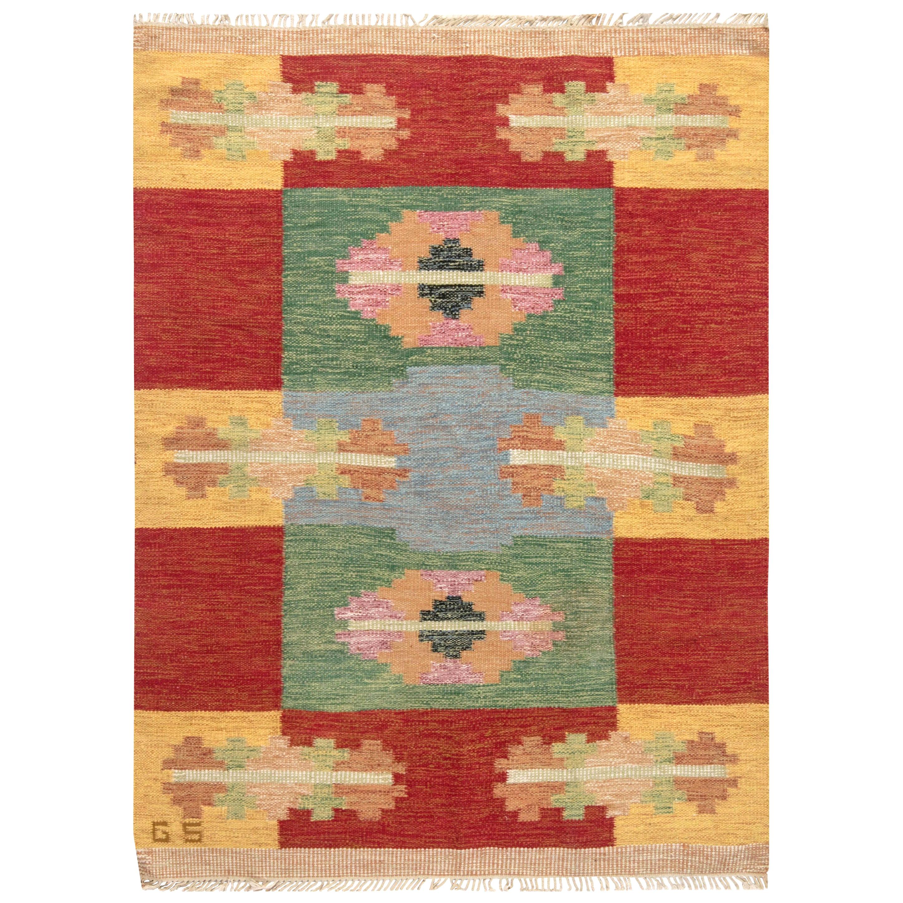 Midcentury Swedish red, yellow and green flat-weave runner by Sverker Greuholm
Size: 5'8