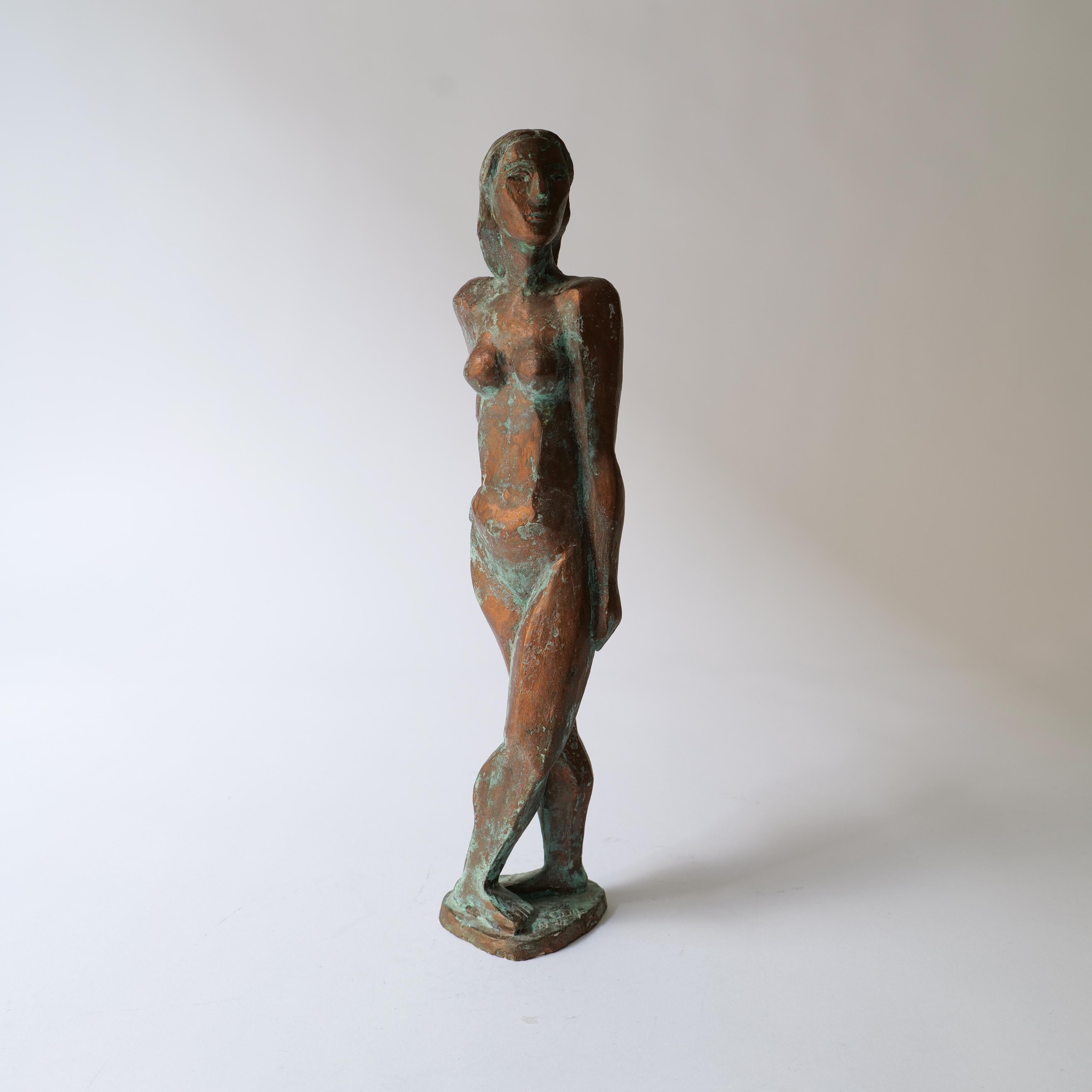 A standing nude with a contemplative stance by Roland Alf (1929-2020) entitled 'Elin'. Plaster of paris and glazed with a patinated bronze. A unique and original piece signed and dated by Roland Alf on base. Swedish, 1960s, Height 27cm.

History:
