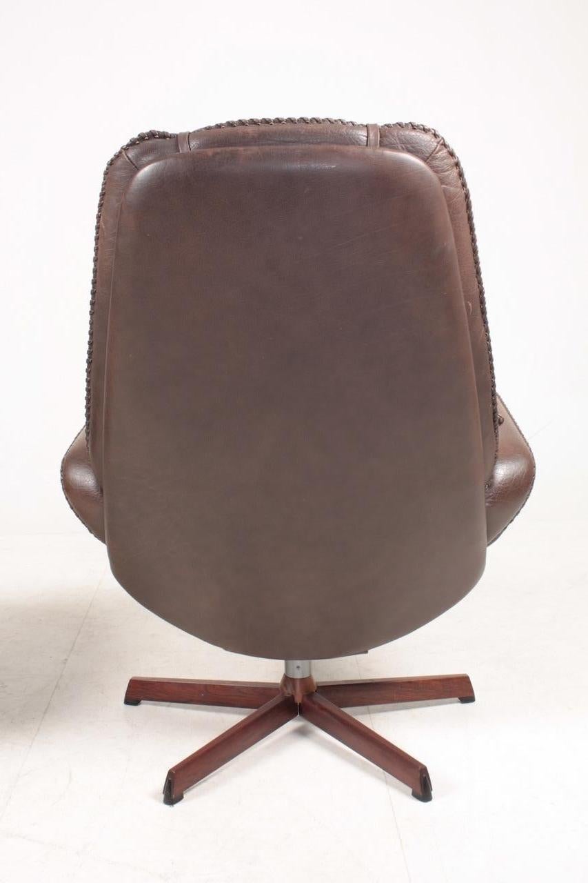 mid century modern swivel chair with ottoman