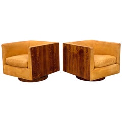 Mid Century Swivel Lounge Chairs by Milo Baughman in Rosewood and Cognac Leather