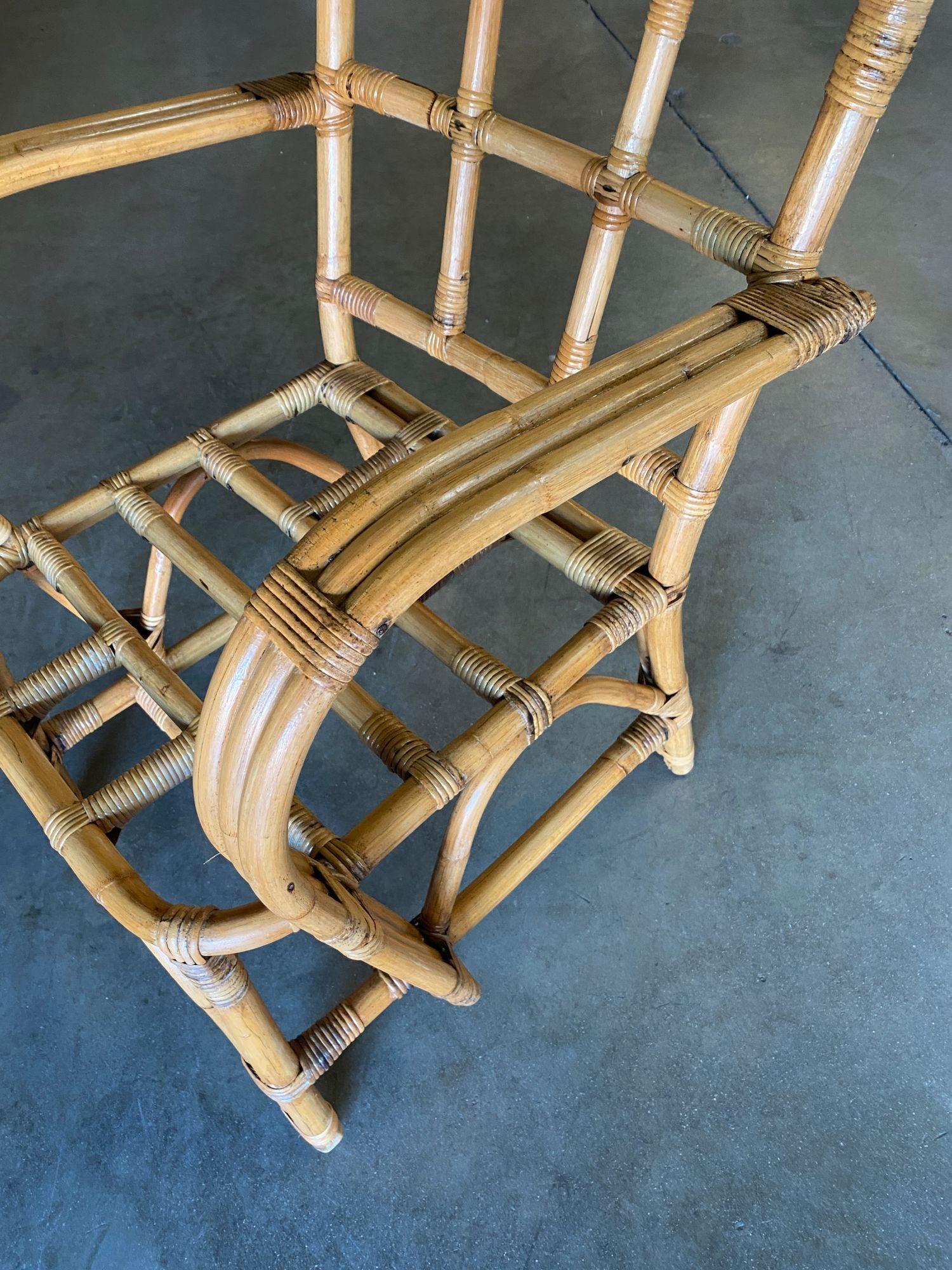 Midcentury Swoop Triple Pole Arm Rattan Armchair with Tic-Tac-Toe Back In Excellent Condition In Van Nuys, CA