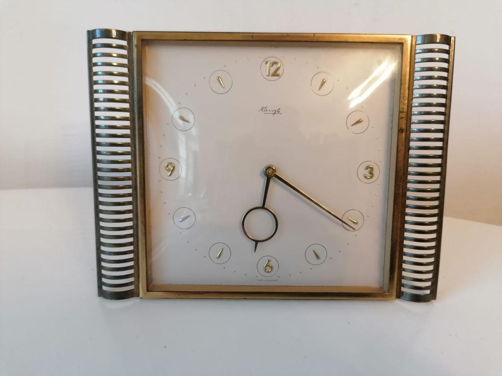 Brass construction with a battery movement for one AAA-battery from the 1960s.
(pictures shows the original movement before changing to battery one).