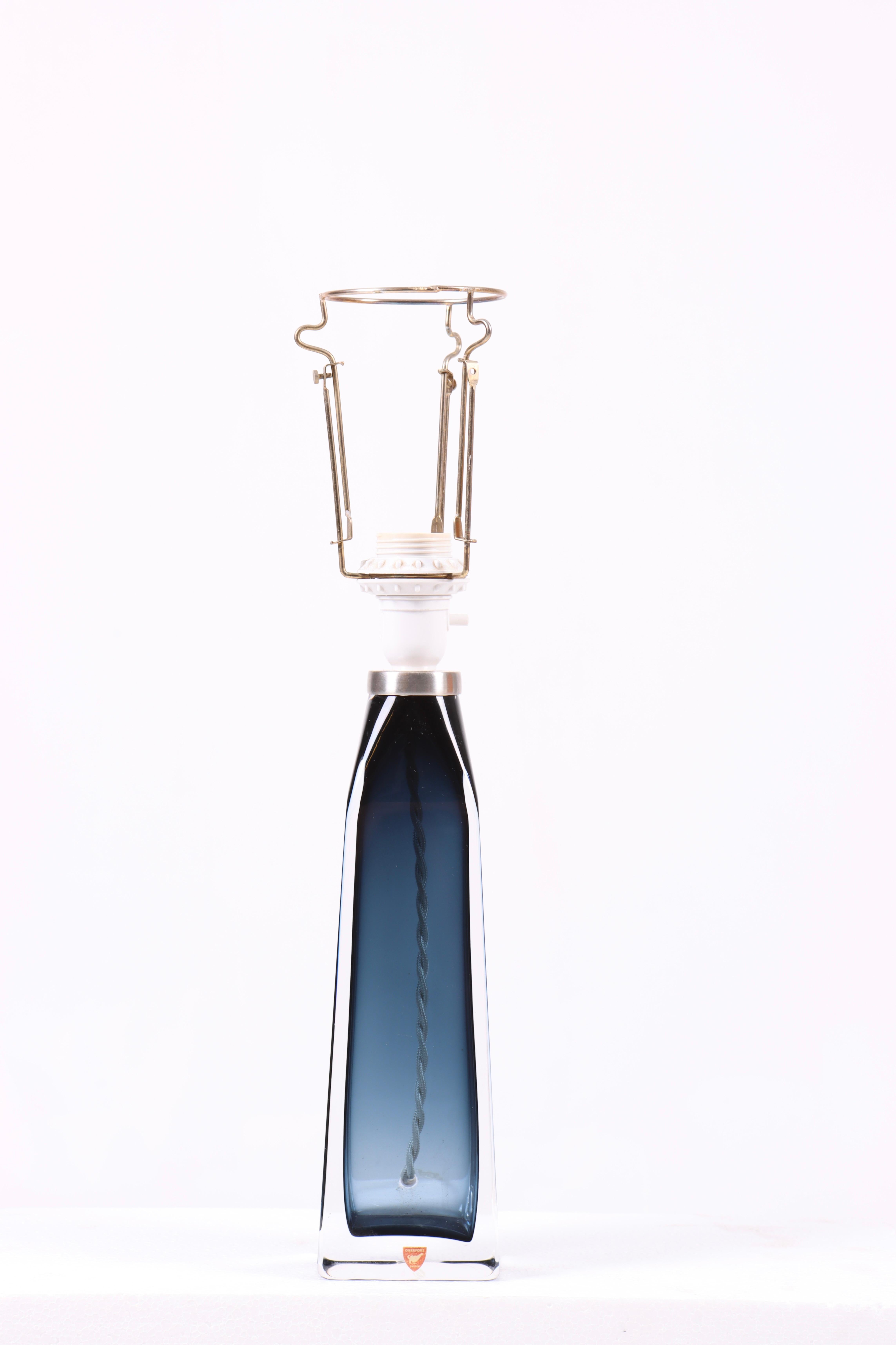 Table lamp in glass designed by Carl Fagerlund for Orrefors Sweden in the 1950s. Great original condition.