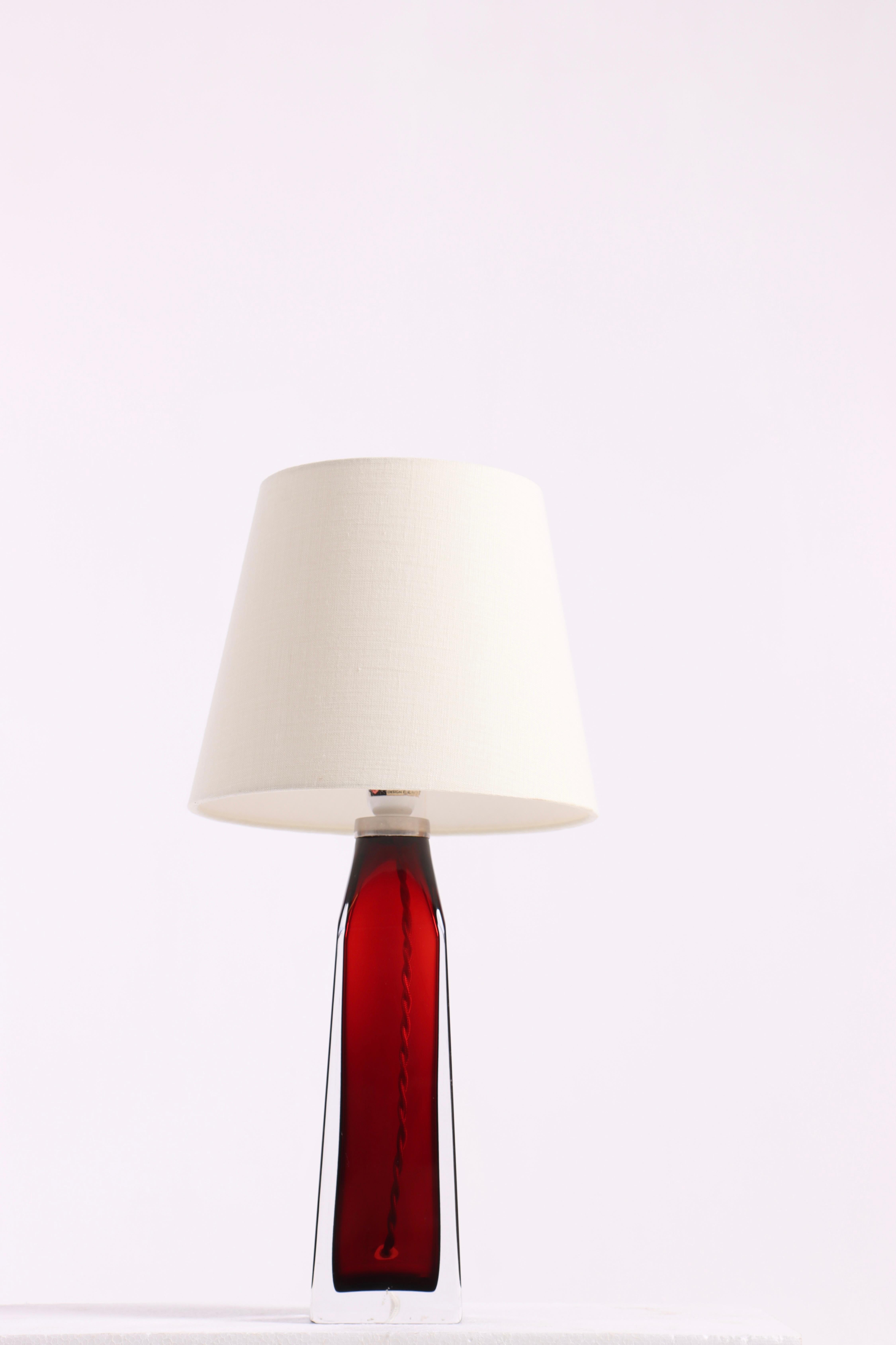 Table lamp in glass designed by Carl Fagerlund for Orrefors Sweden in the 1950s. Great original condition.