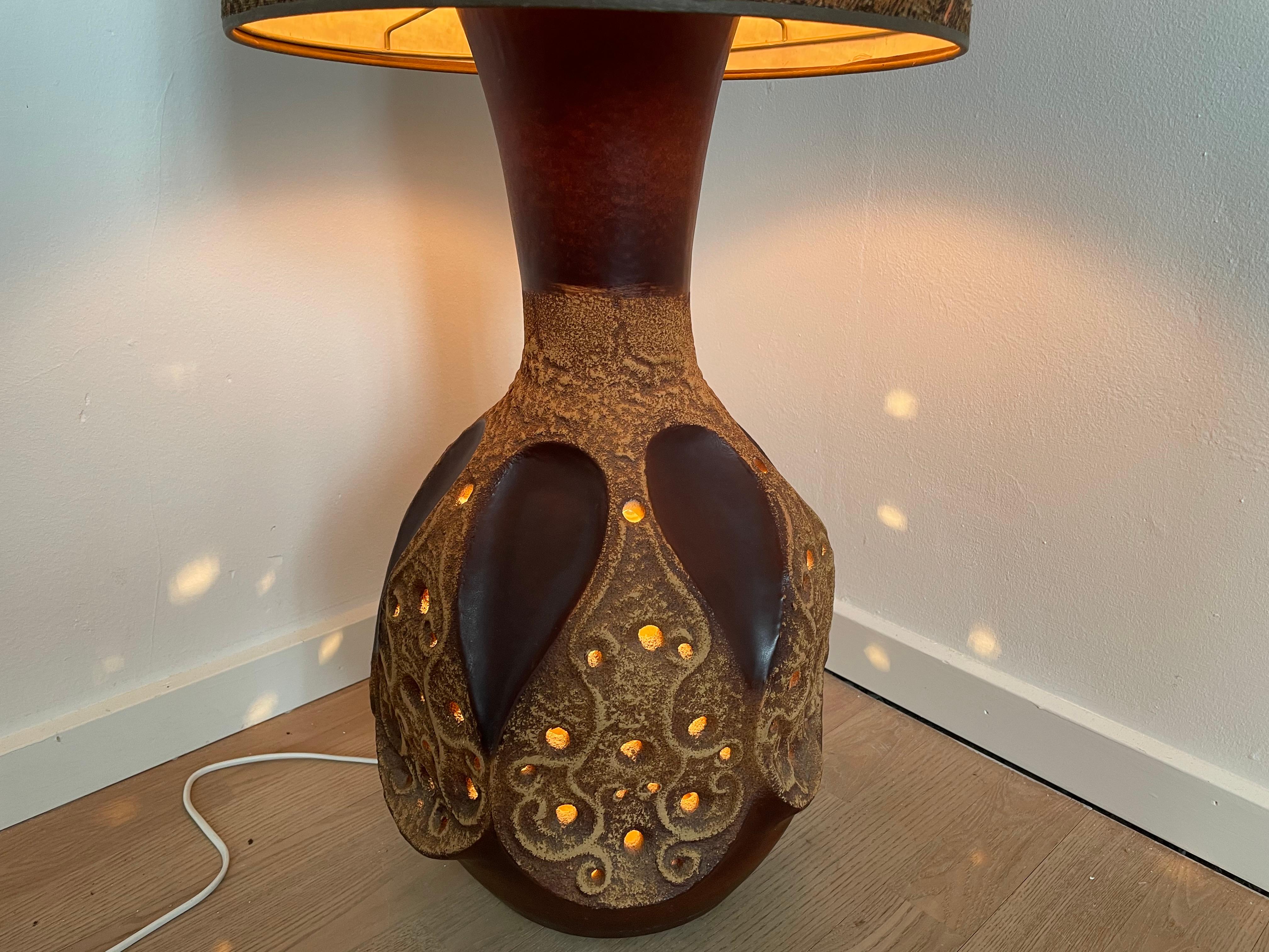 Rare vintage West German Pottery tall floor lamp. Original lampshade.
The lamp also features lamp holder inside the base.
  