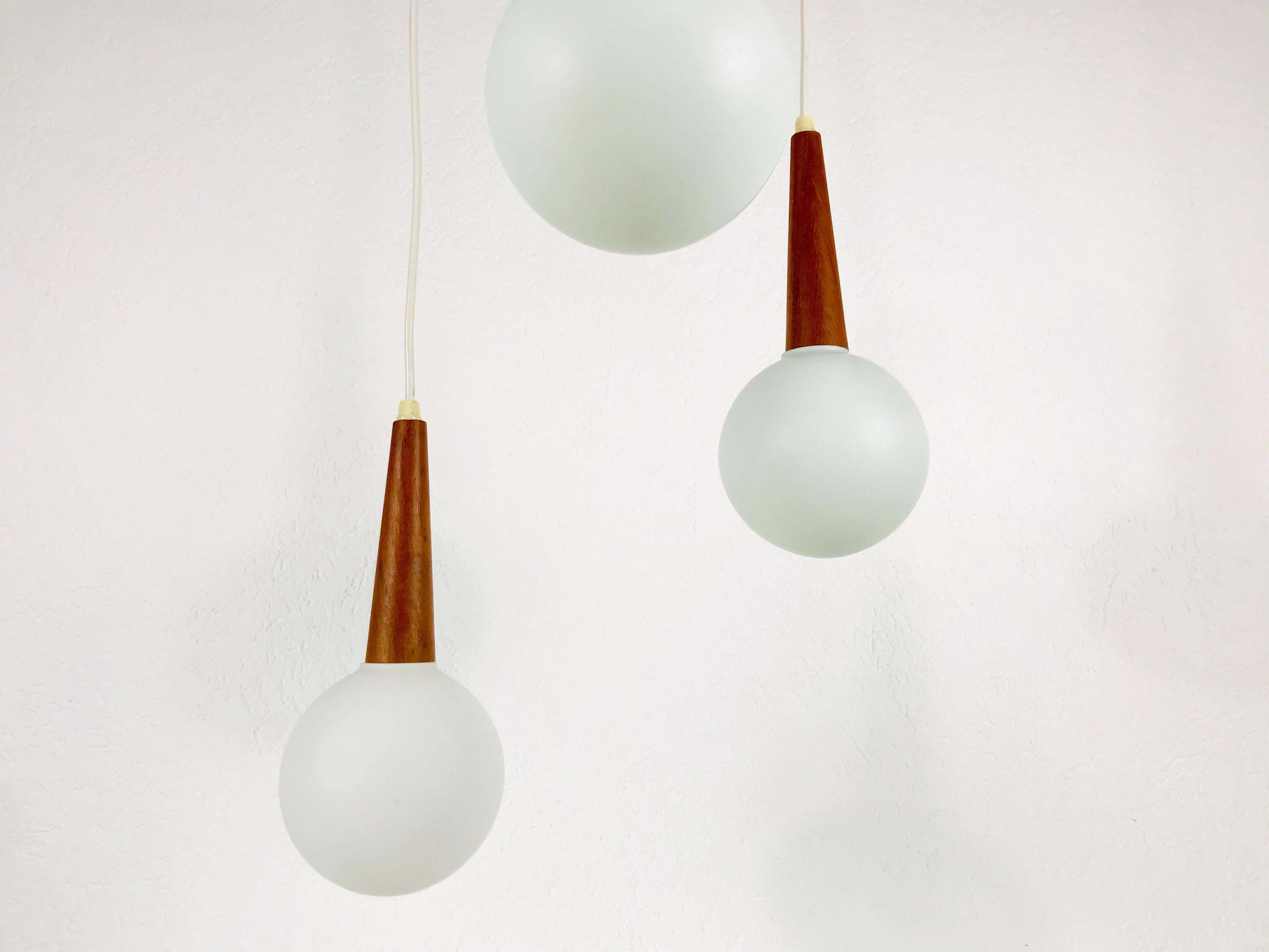 Midcentury Teak and Opaline Glass Cascade Pendant Lamp Attributed to Luxus 1960s 1