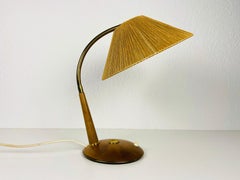 Lampada da tavolo in teak e rattan del Medioevo di Temde, circa 1970