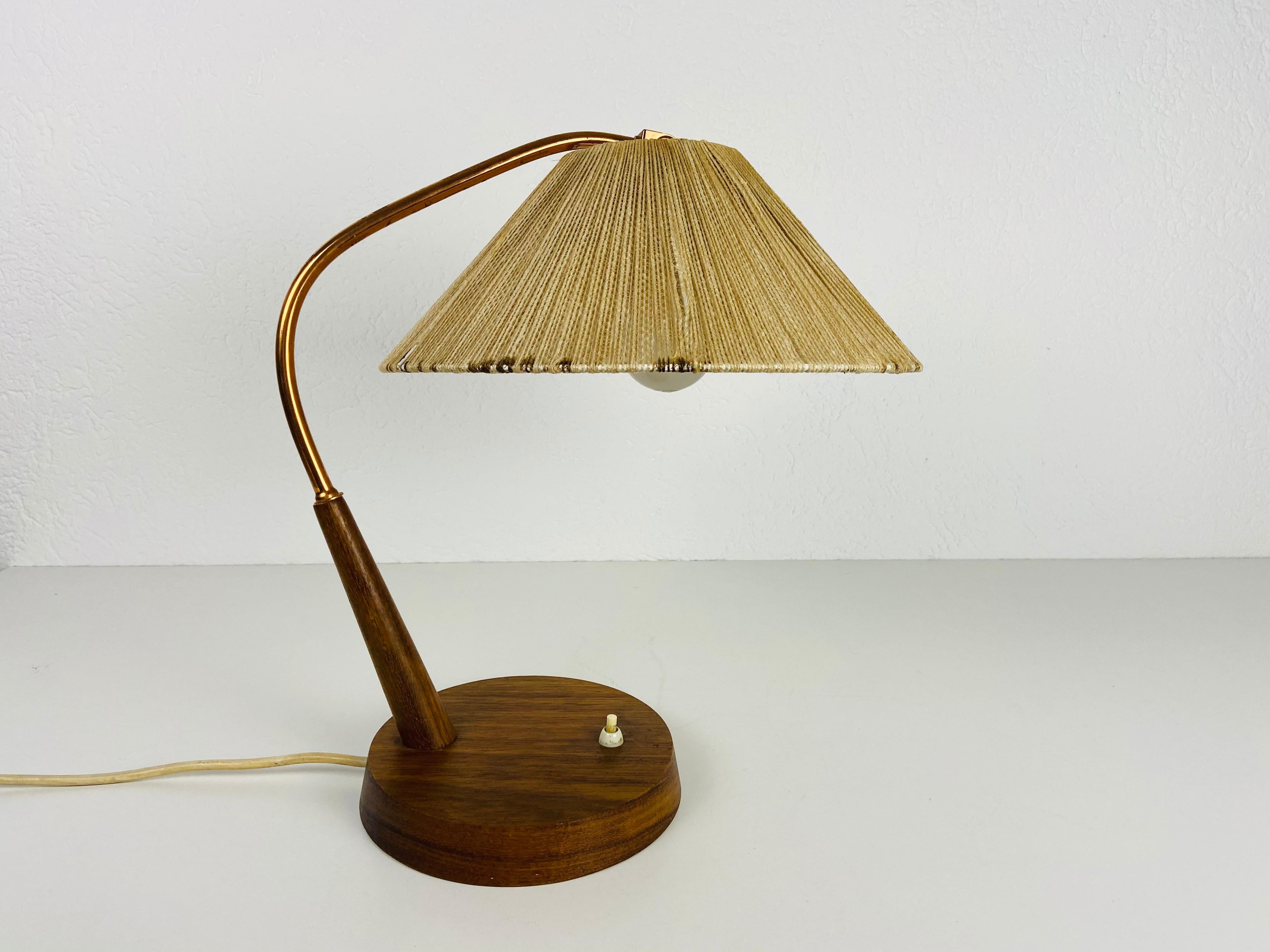 Mid-Century Modern Midcentury Teak and Rattan Table Lamp by Temde, circa 1970 For Sale
