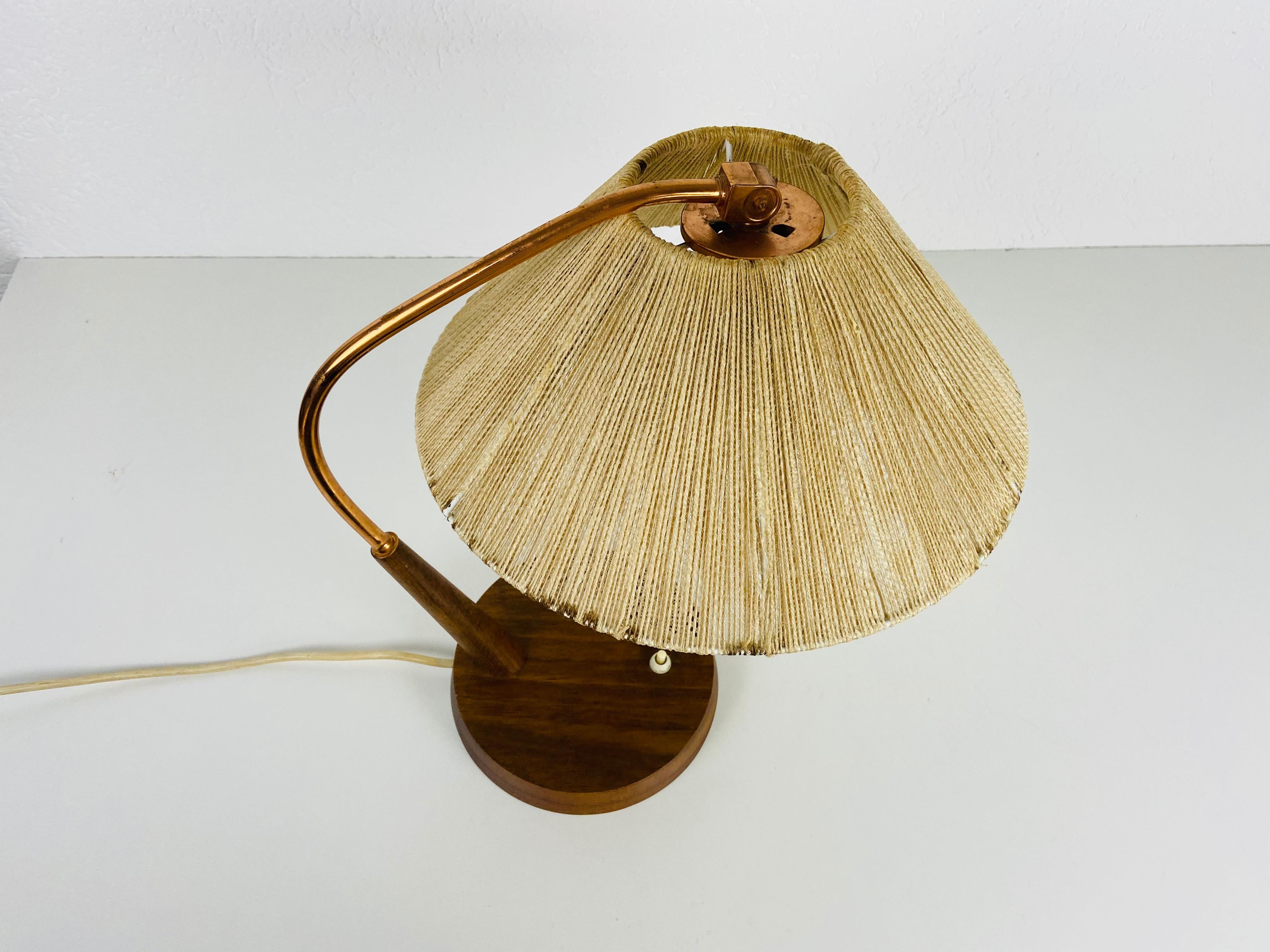 Mid-20th Century Midcentury Teak and Rattan Table Lamp by Temde, circa 1970 For Sale