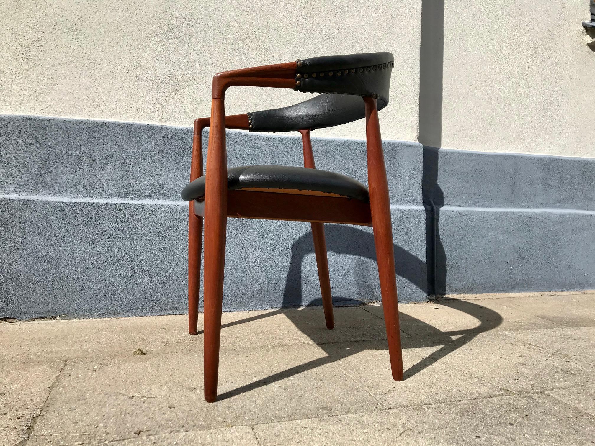 Sillón de teca de mediados de siglo 