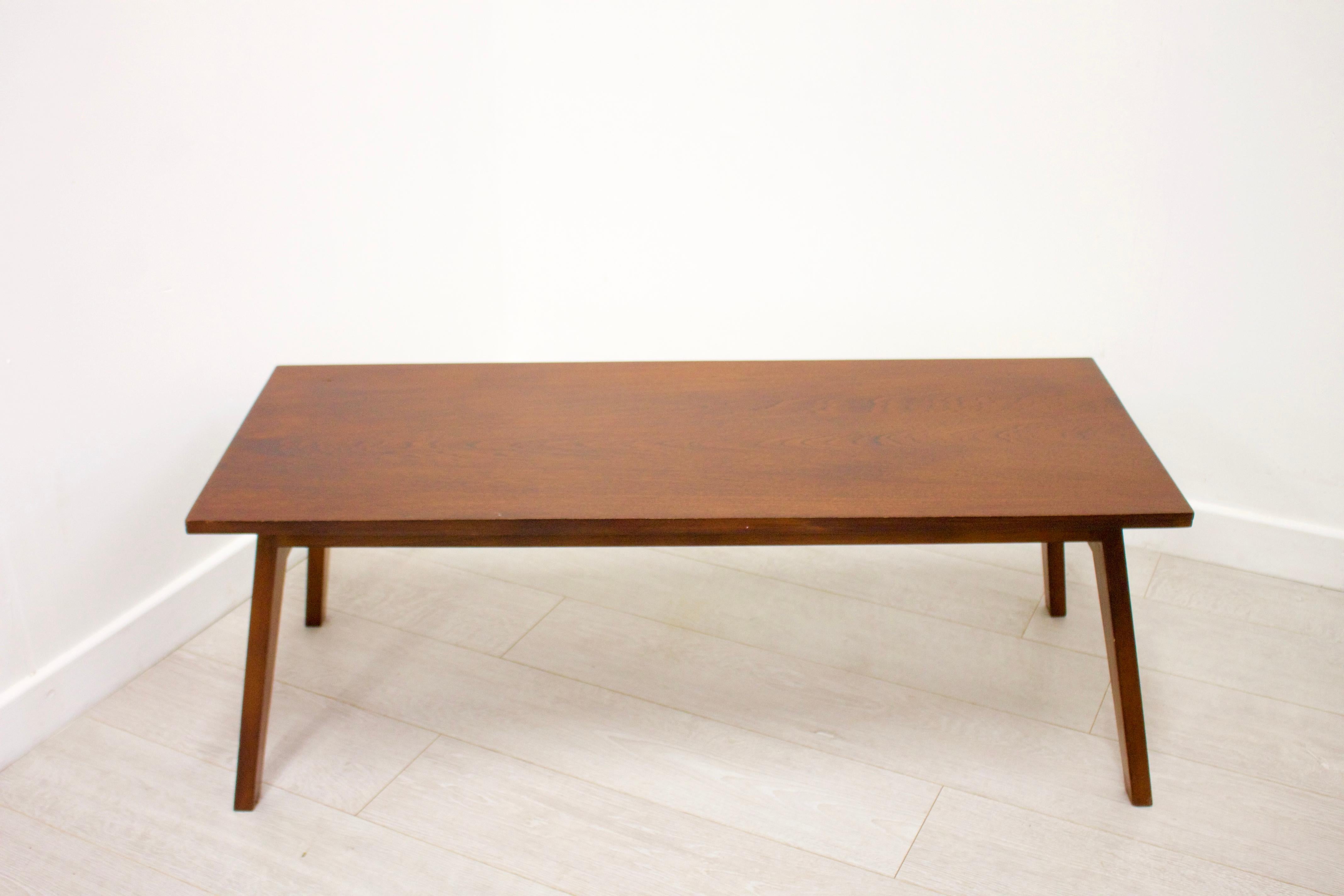 - Midcentury coffee table
- Made from teak.