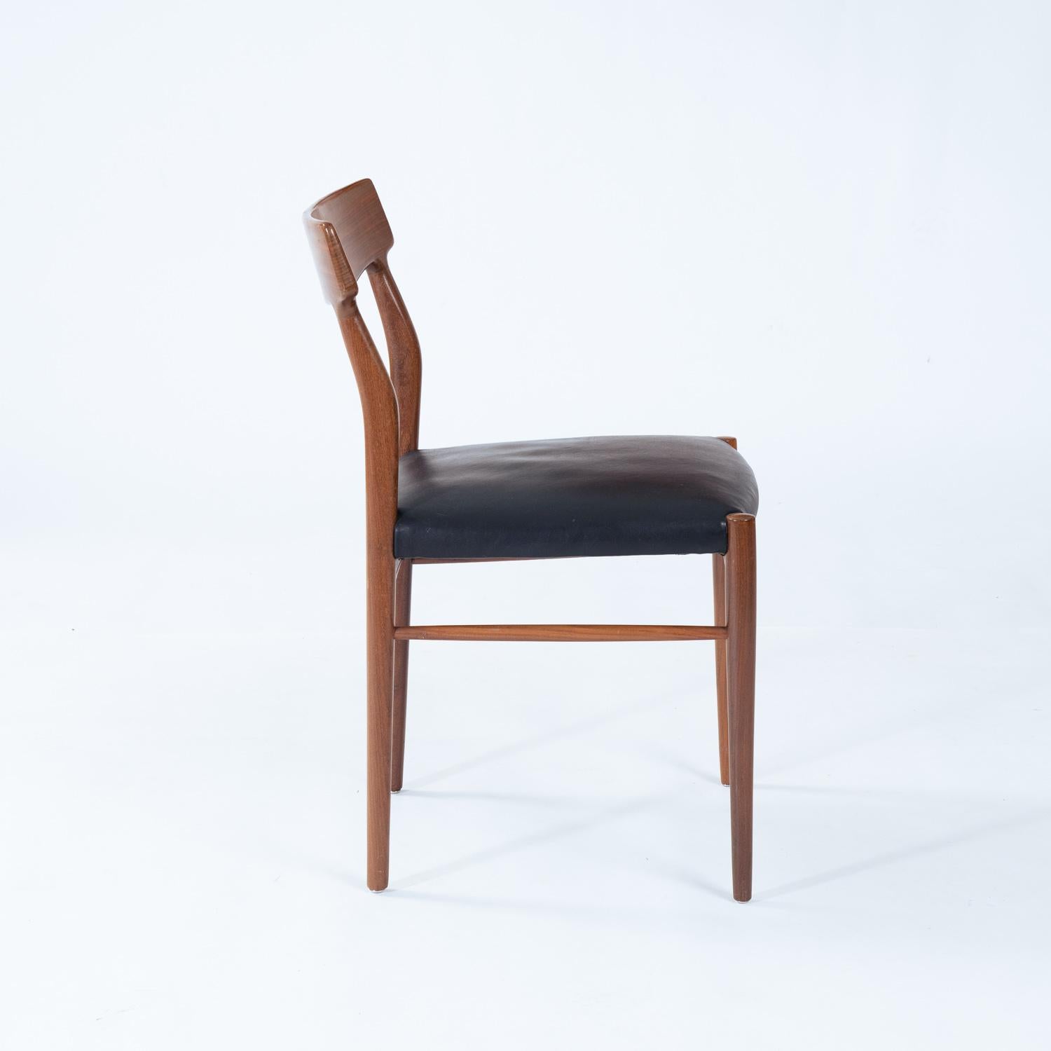 Set aus Teakholz-Design aus der Mitte des Jahrhunderts mit ausziehbarem Tisch und 6 organisch geformten Stühlen im Angebot 1