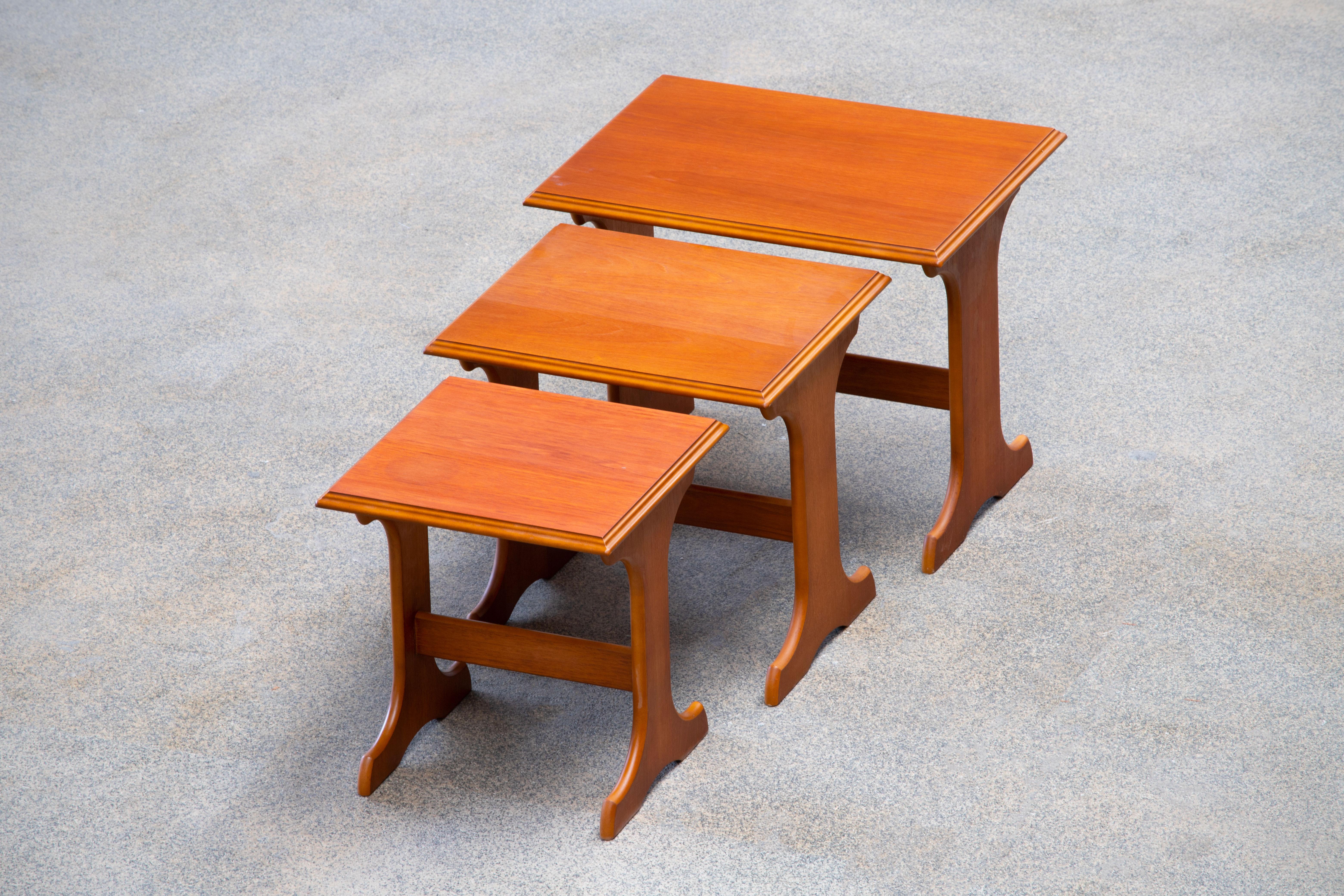 British Midcentury Teak Nesting Coffee Tables For Sale