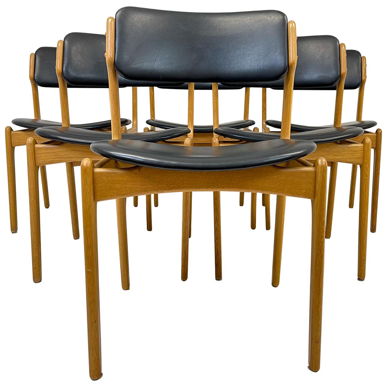 These 6 dining chairs was produced in Denmark in the 1960 and designed by Erik Buch. 
Nice dark leather with oak frame. 

Good vintage condition, some scratches to the leather and small wear on the oak. 

Dimensions: H 79 cm x W 51 cm x D 52