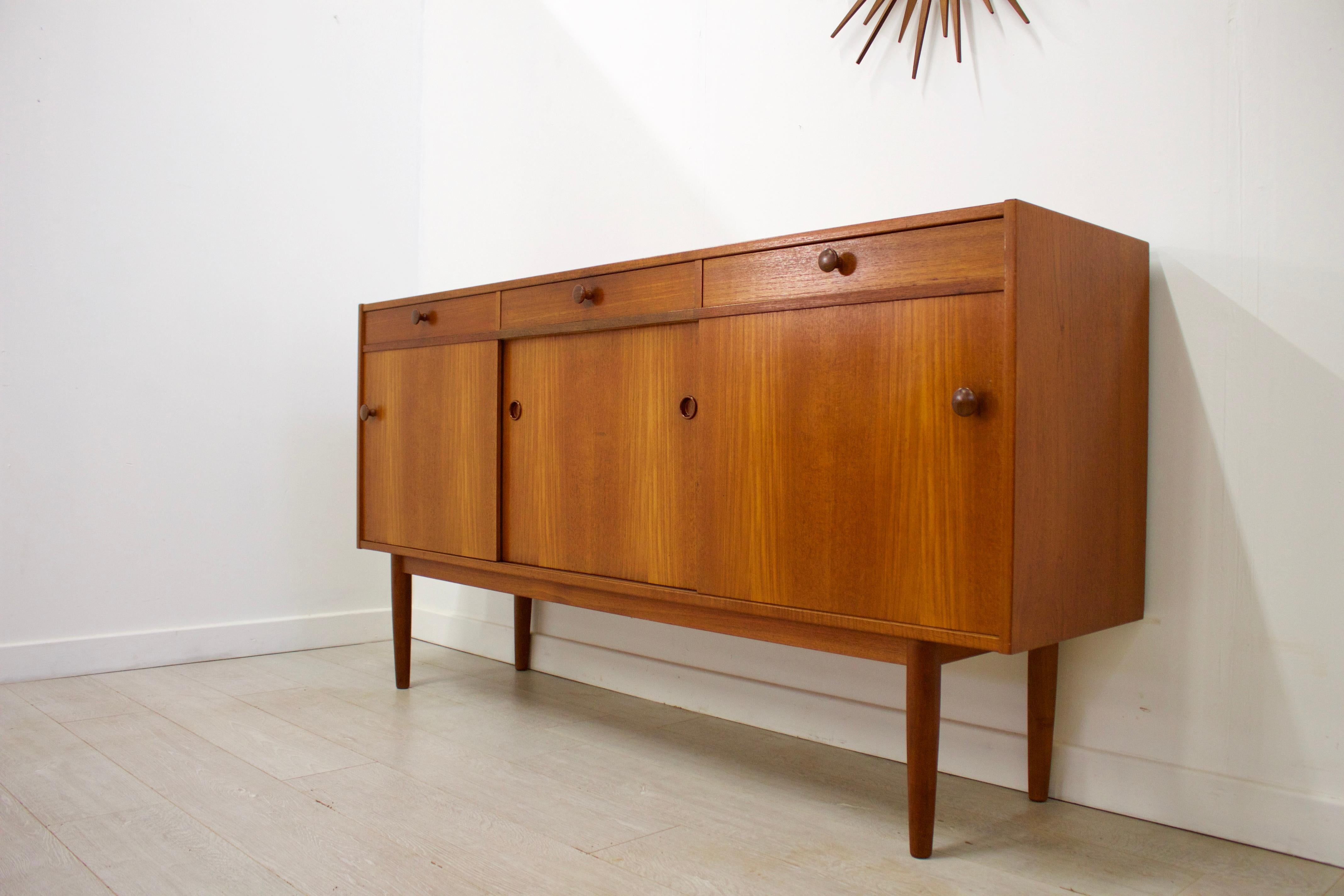 - Mid-Century Modern sideboard.
- Designed by Nils Jonsson for Troeds.
- Manufactured in Sweden.
- Made from teak and teak veneer.