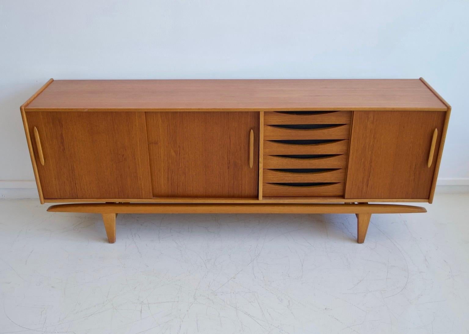 Scandinavian Modern Midcentury Teak Sideboard with Sliding Doors and Drawers