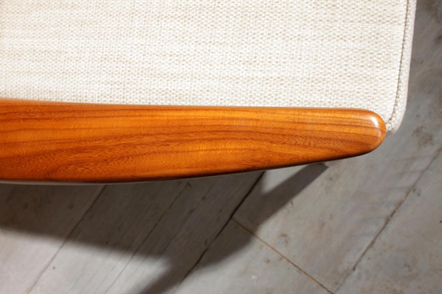 Midcentury teak sofa, circa 1960
This teak two-seat sofa was produced in the 1960s in Denmark she has a lovely shaped back and solid frame there are no old breaks or repairs and all the joints are solid.

The wood on the sofa has been repolished