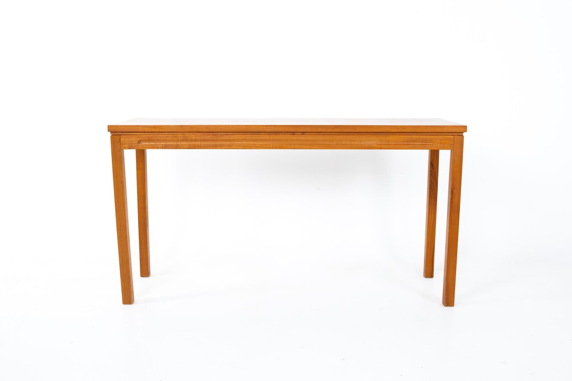 Mid Century teak sofa table foyer entry console.
Console measures: 46.5 wide x 14 deep x 25 inches high

Each piece of furniture is available in what we call restored vintage condition. Upon purchase it is thoroughly cleaned and minor repairs are