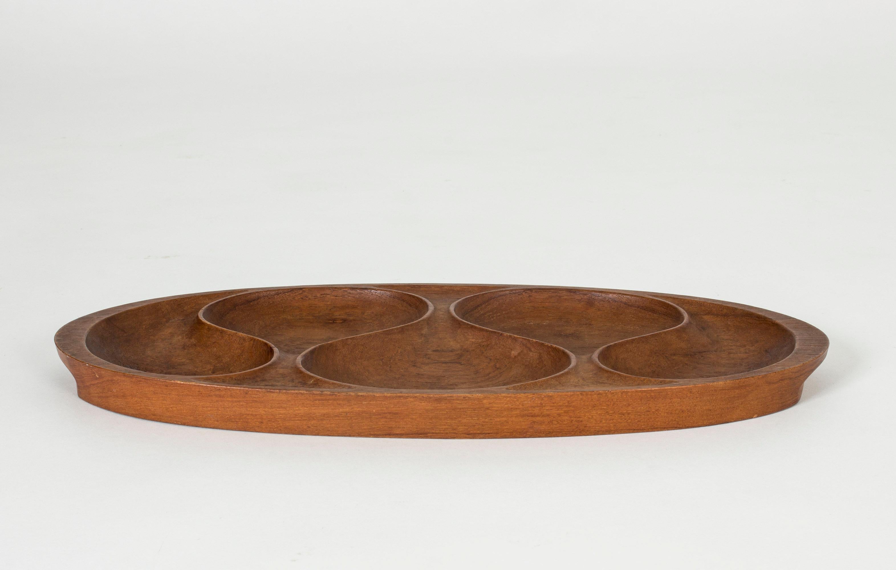 Beautiful solid teak tray from Laur. Jensen, with carved indentions making compartments for snacks or odds and ends.