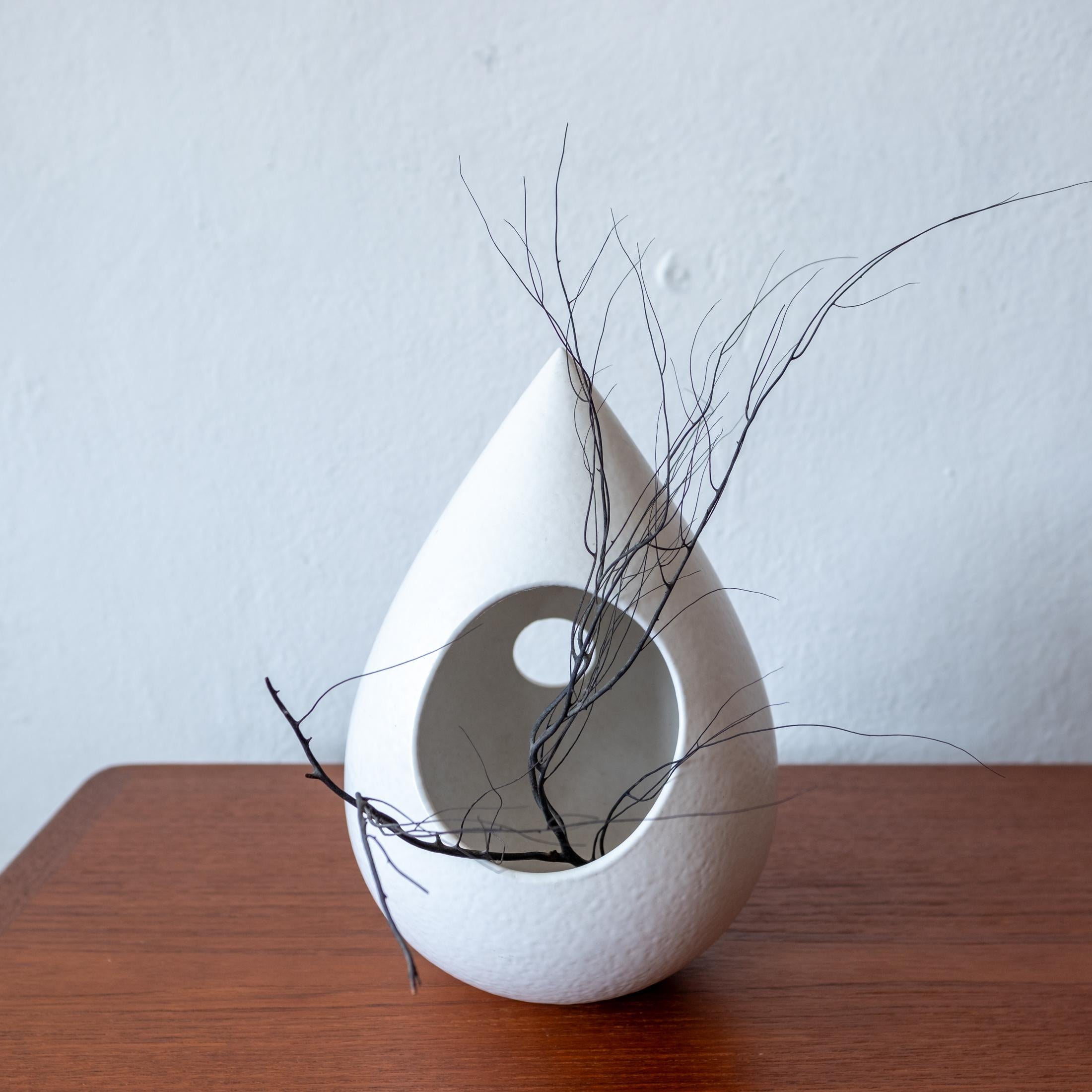 Sculptural tear drop ceramic modernist Ikebana vase. Textured white glaze . Retains the original paper label. Japan, 1960
