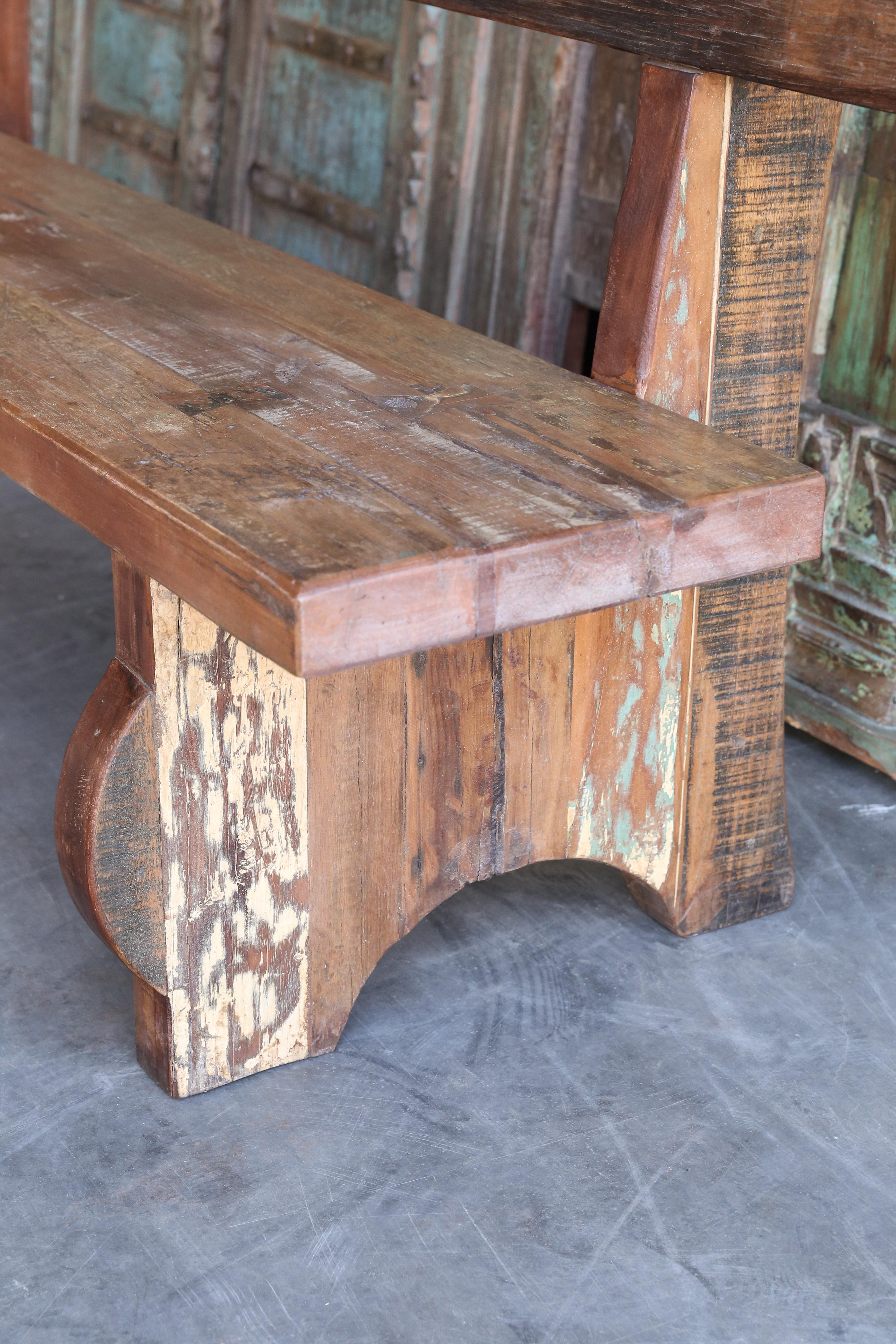 This elegant robust garden bench with back support comes from a tea plantation in the Himalayan slope. You can see the way the bench is put together by old fashioned butterfly joints and by old world carpentry. It is heavily made to last several