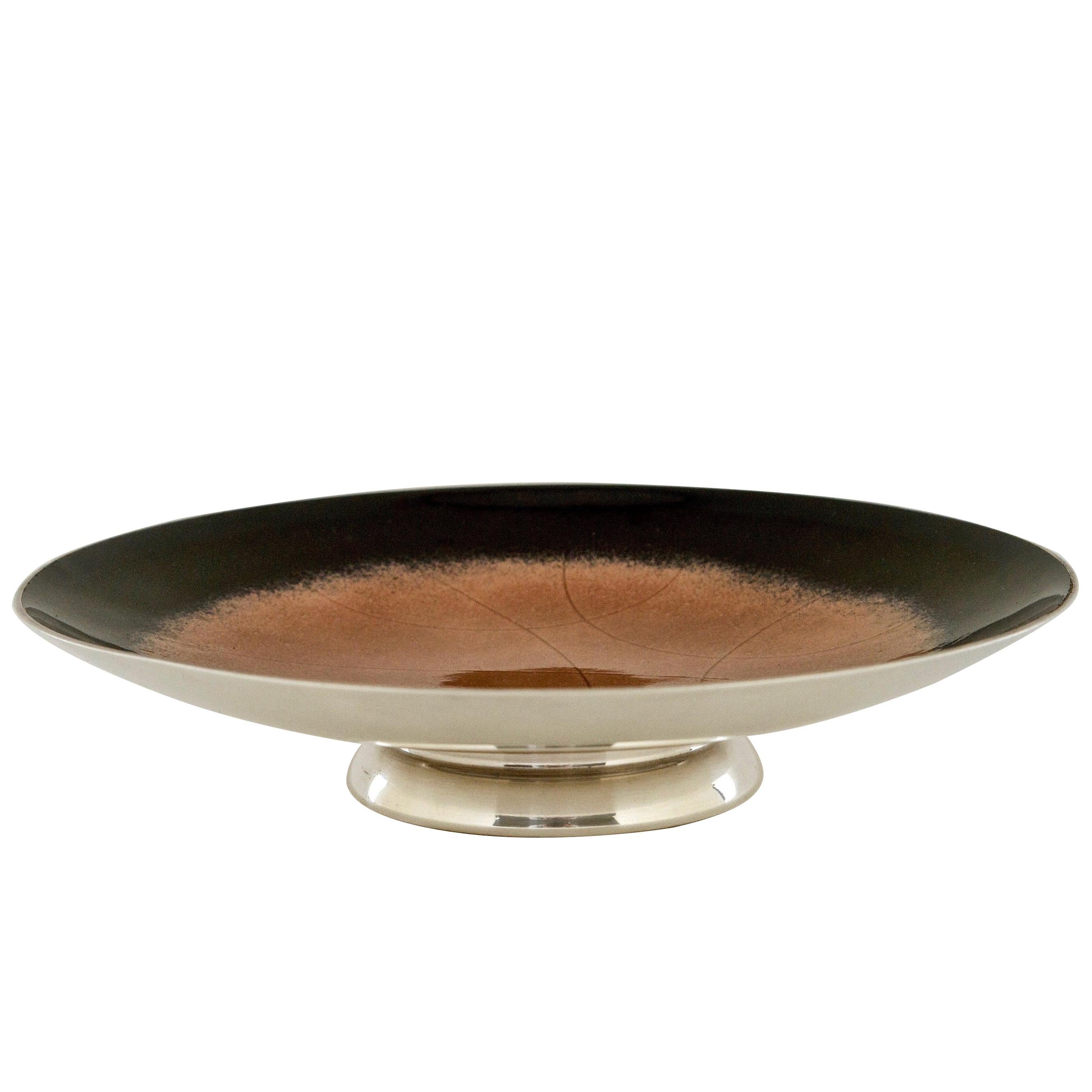 A stylish Mid-Century Modern enameled tazza (a shallow footed dish) from Towle Silversmiths of Newburyport, Massachusetts, circa 1955. This vintage piece is Illustrated on page 273 of Jewel Stern's publication, Modernism in American silver 20th
