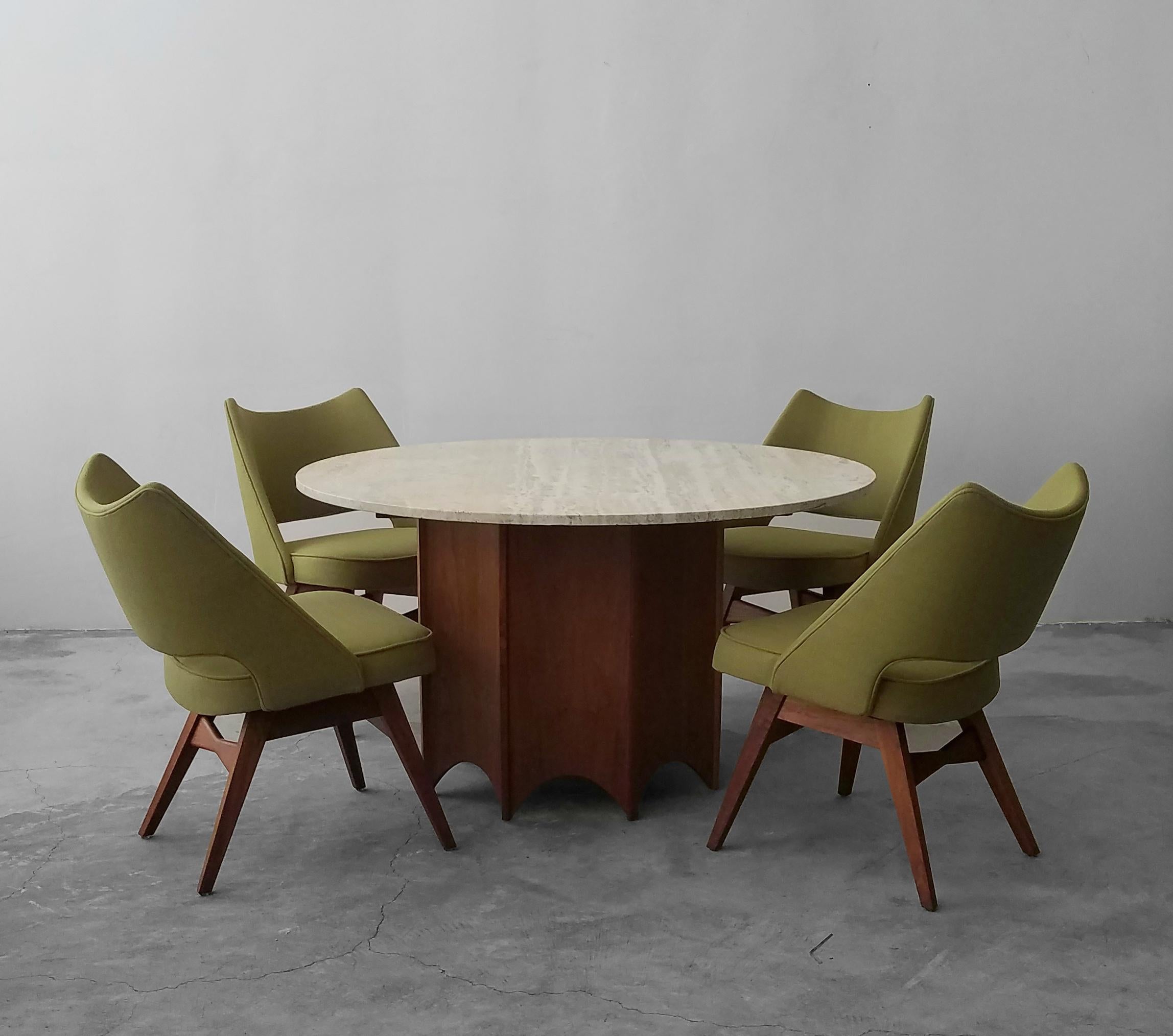 A beautiful Classic midcentury set. This gorgeous Travertine and Walnut Game Table and Chairs Set by Harvey Probber is a must for any true midcentury enthusiast or anyone looking for a game table that has timeless class and style. The set includes