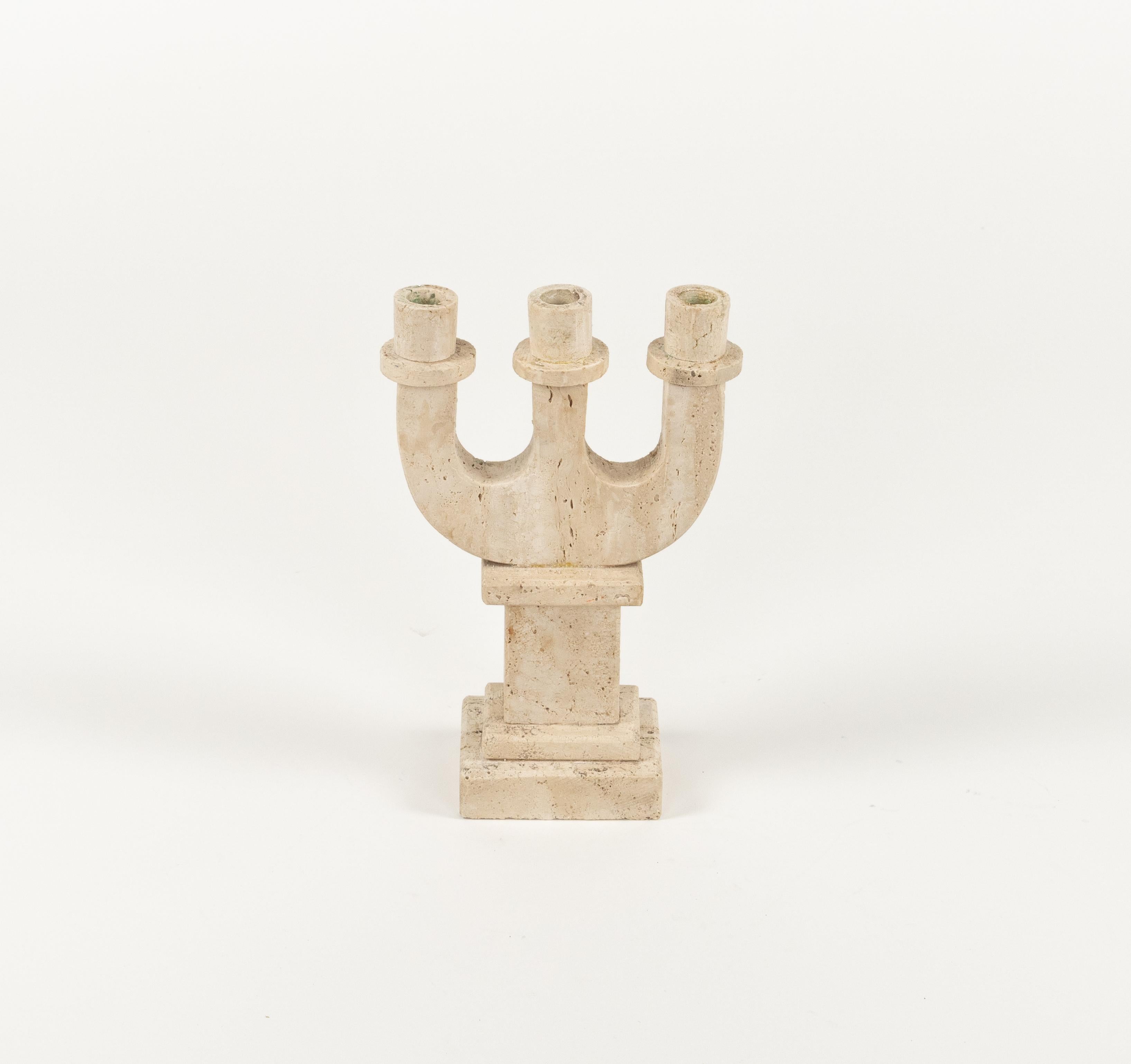 Midcentury amazing candle holder three-arm in travertine attributed to Fratelli Mannelli.

Made in Italy in the 1970s.
