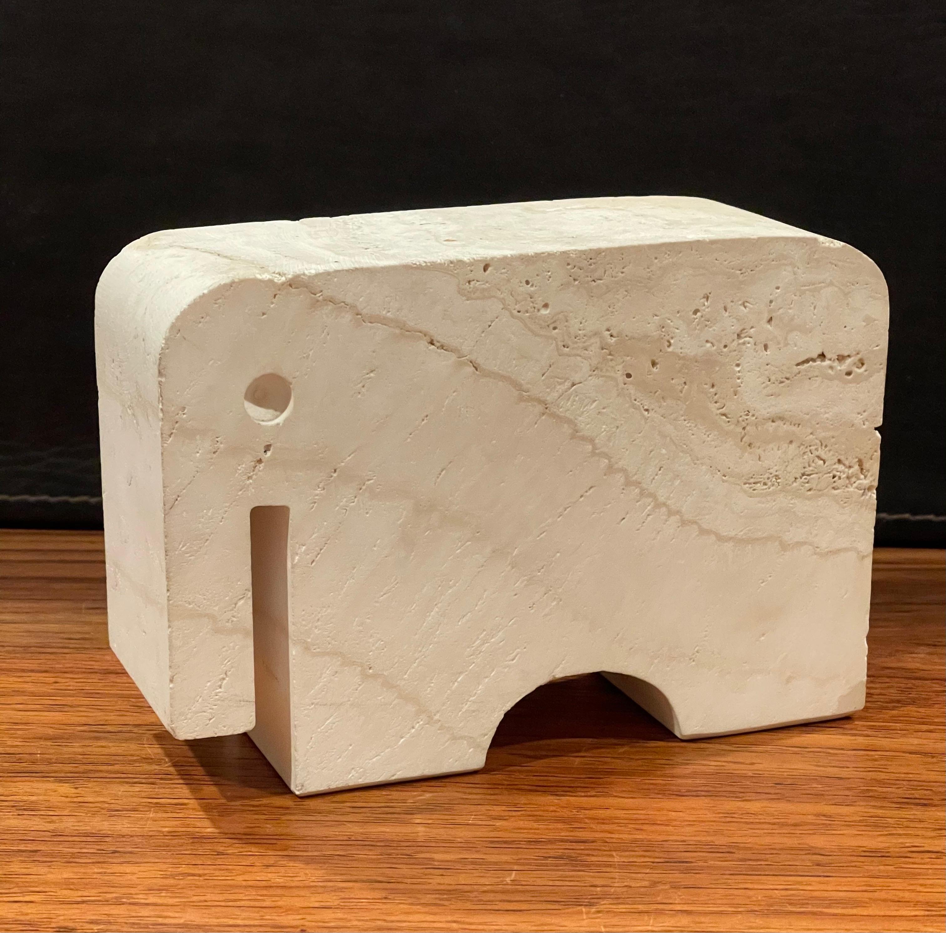 A very cool Mid-Century Modern Italian travertine elephant sculpture or bookend by Fratelli Mannelli of Signa, Italy, circa 1970s. The piece is in very good vintage condition with no chips or cracks and measures 6.75