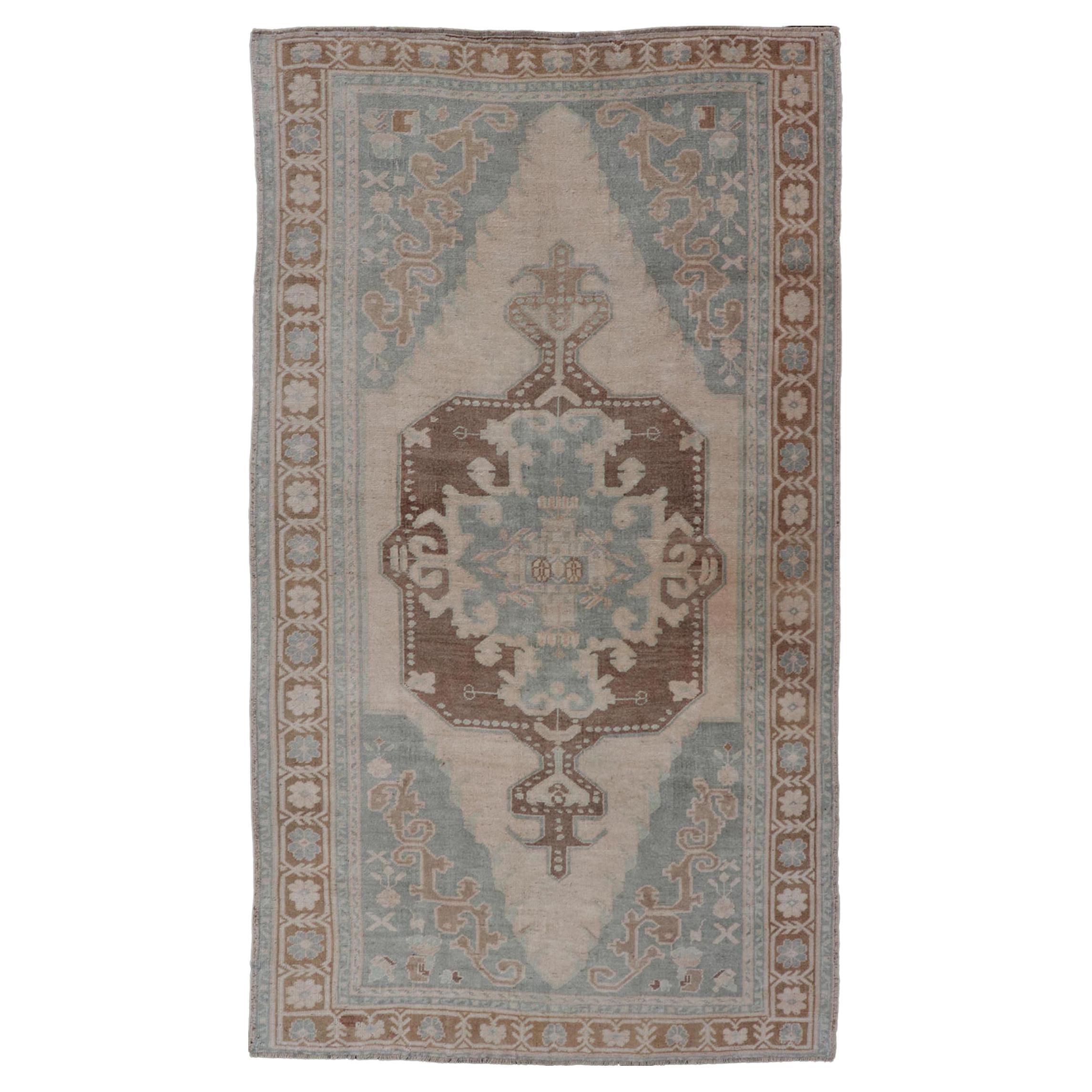 MidCentury Turkish Oushak Rug in Wool with Sub-Geometric Etched Medallion Design For Sale