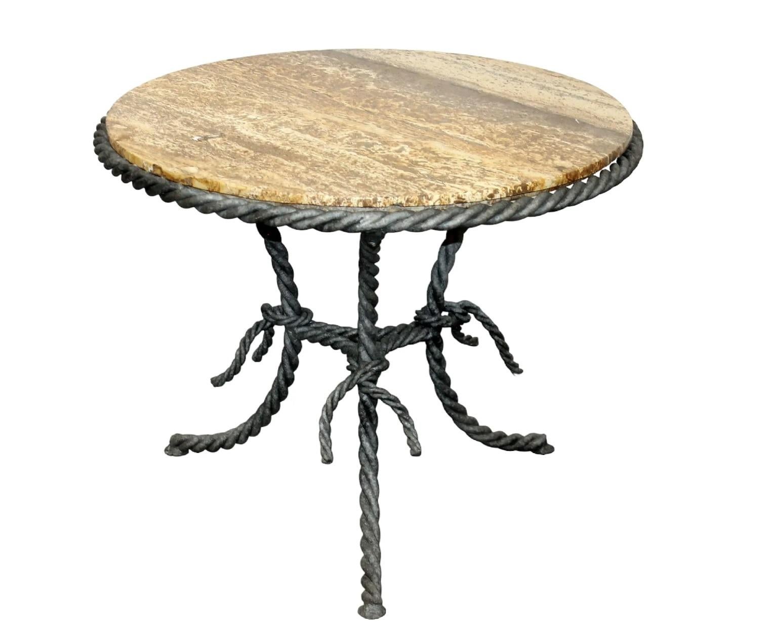 Midcentury iron side table with twisted rope motif base and round travertine top.