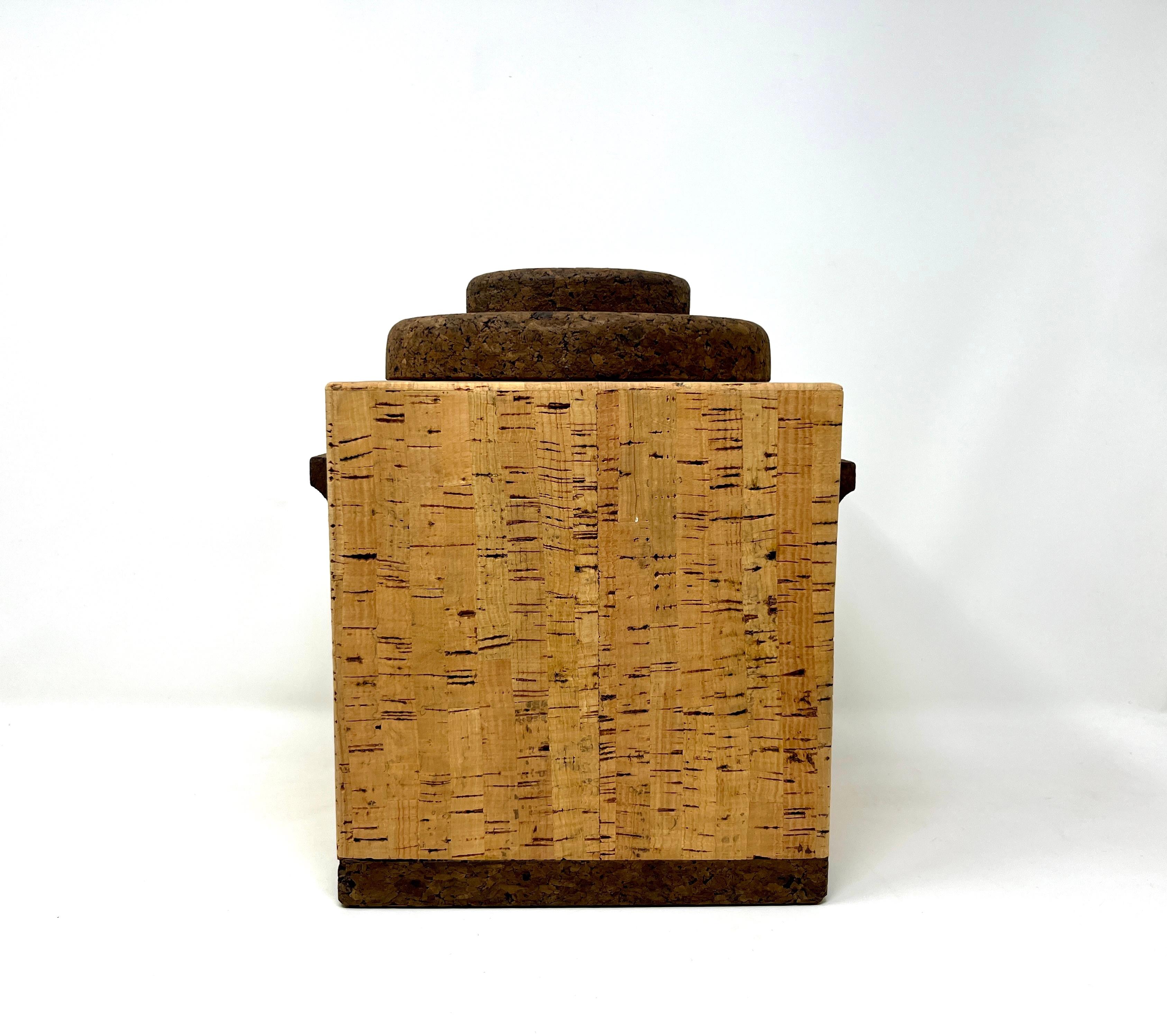 Portuguese Midcentury lidded cube-shape ice bucket formed from cork with round cork lid and plastic insert. In the style of Boda Nova as well as Mort Marton designs of the period. Retains original sticker on base showing 