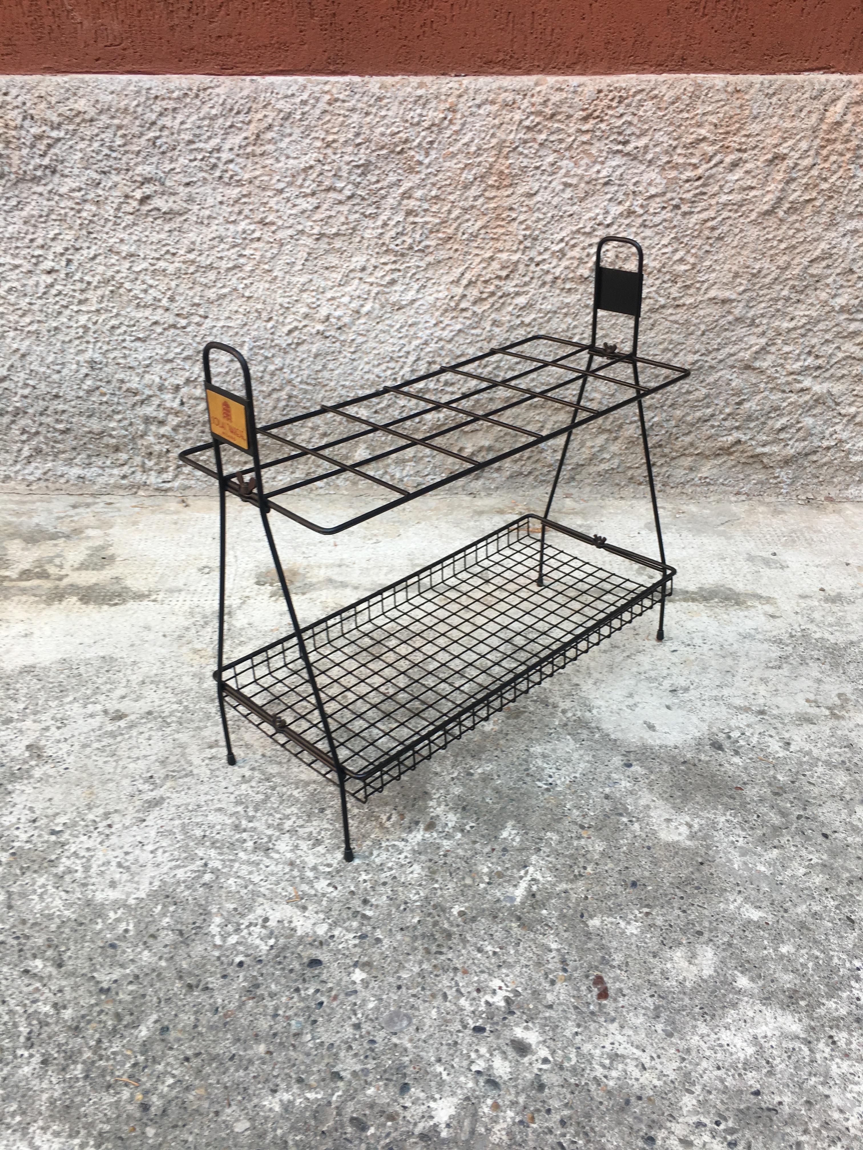 Mid century advertising umbrella stand in wire steel from 1950s
Italian umbrella stand or magazine rack from Italian mid century, made in wire steel with 2 shelves and organic design.
This is a typical Italian product and design, made by Solai