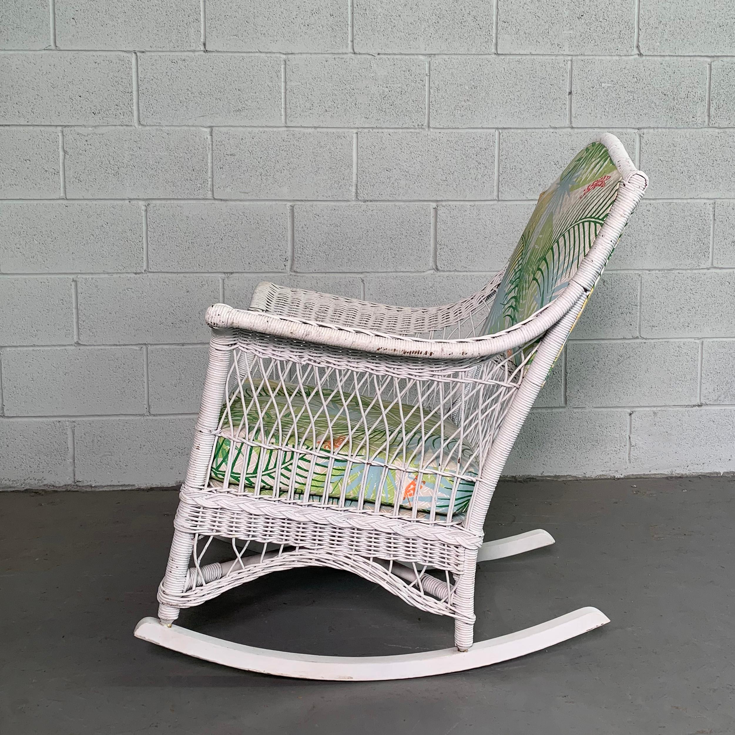 white upholstered rocking chair