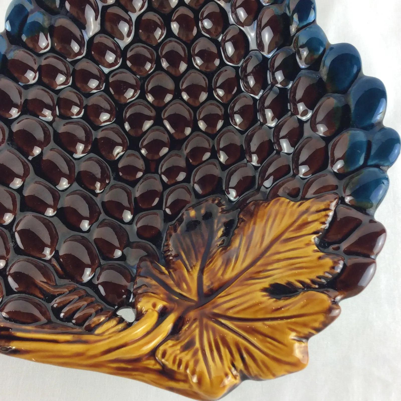 Mid-Century Vallauris Majolica Ceramic Platter

Unique and colorful leaf shaped glazed ceramic platter, serving tray or centerpiece manufactured by Vallauris France, pottery makers, circa 1950s. Hand-crafted and imported from France. 

Interesting