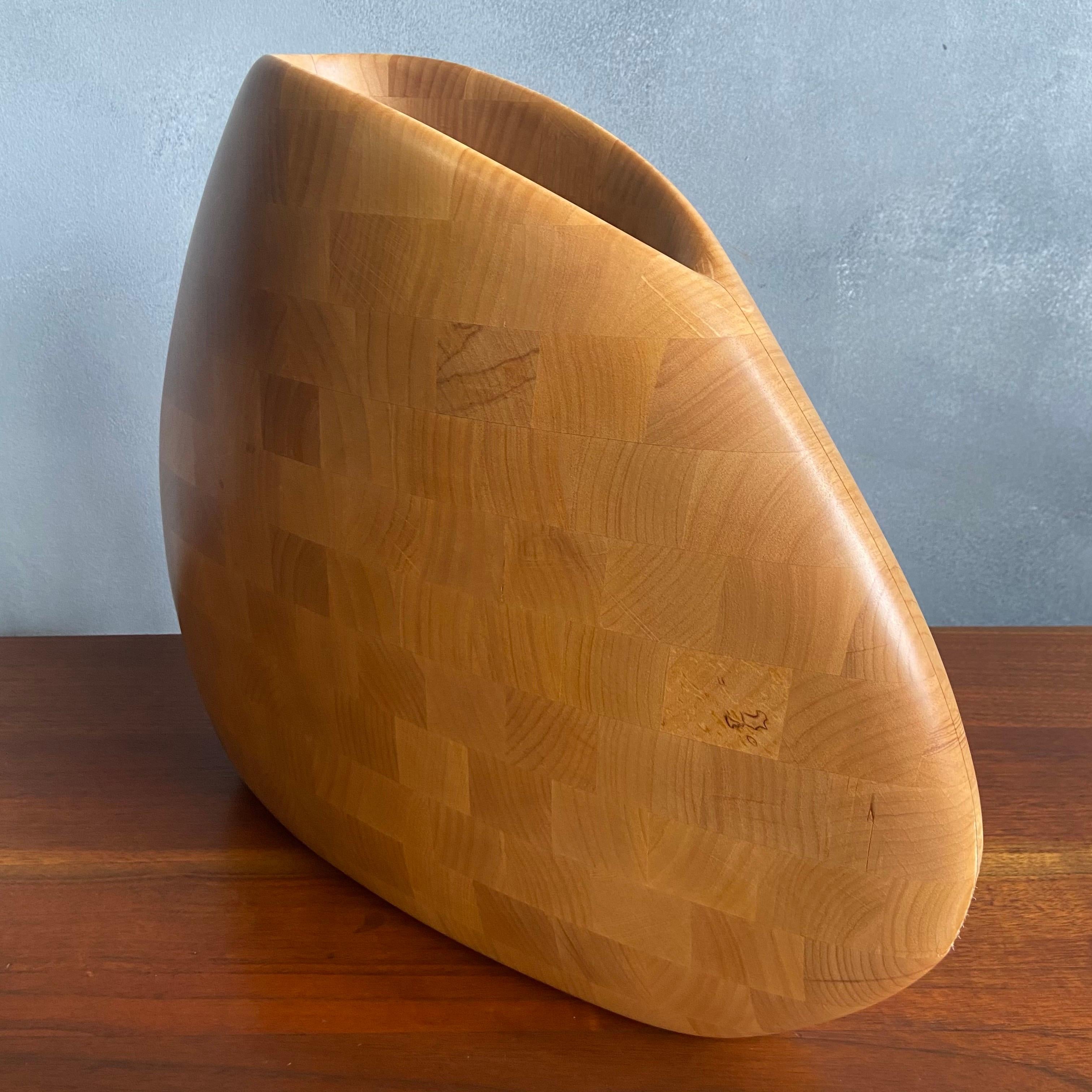 For your consideration is this beautifully sculpted vase by Master Craftsman Dean Santner. Santner designs are part of the American Modern Craft movement along side Wendell Castle, Nakashima, Phillip Powell to name a few. This hand sculpted piece