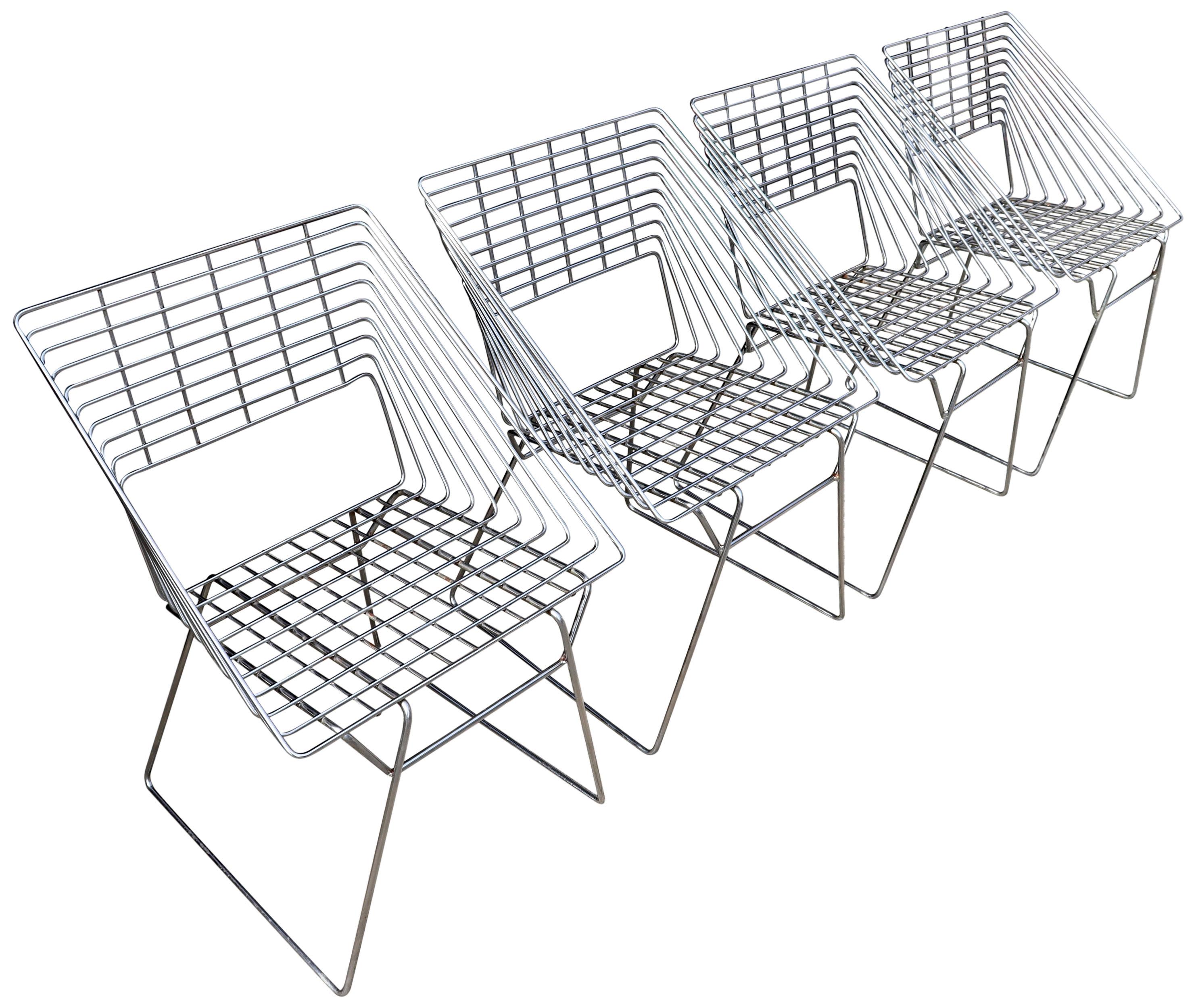 For your consideration are these striking wire cube chairs designed by Verner Panton. Heavy wire grid construction gives the illusion of empty space much like the Pantonova series. A ultra post modern and forward thinking design thats dates over 50