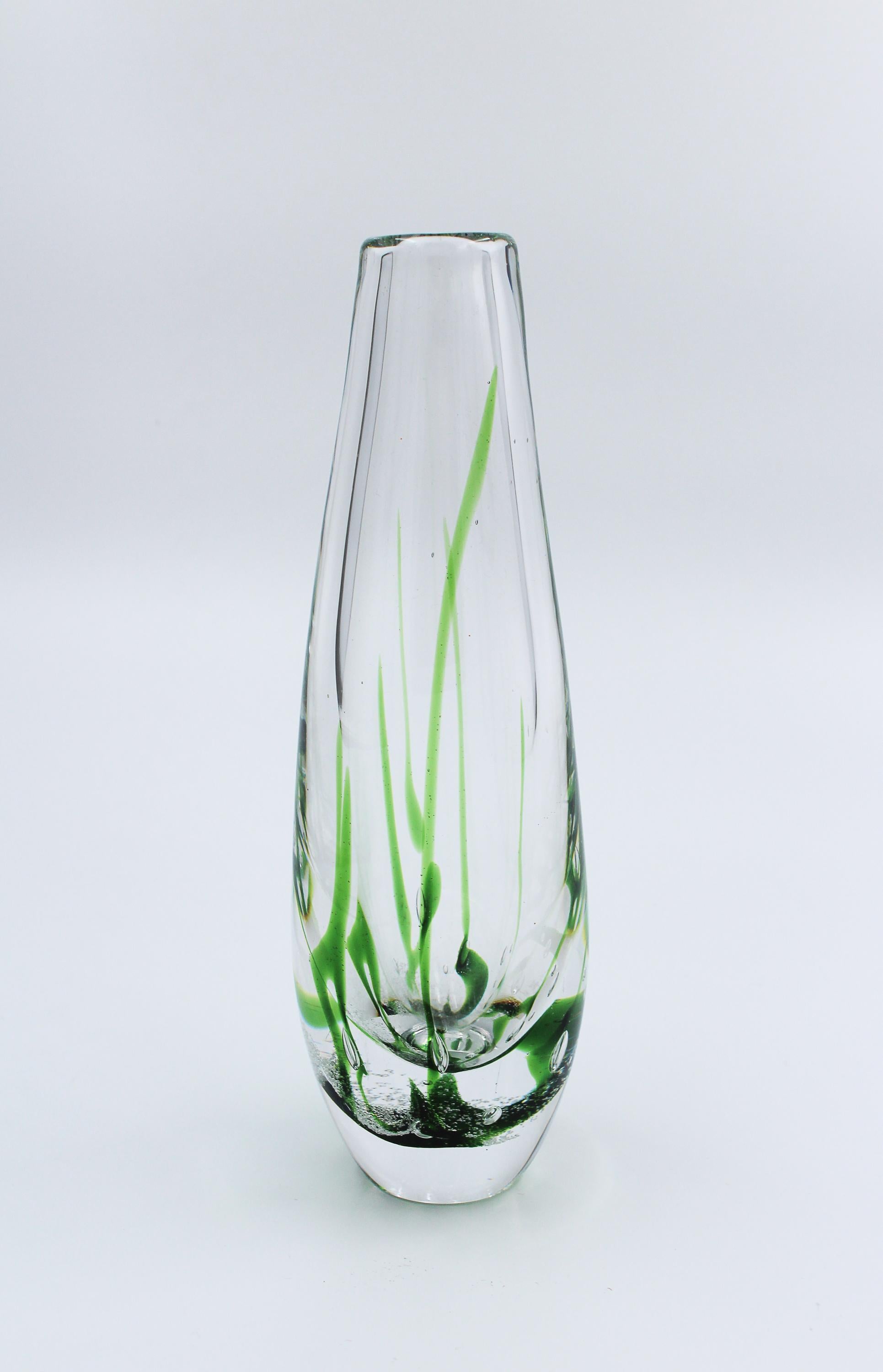 A very decorative midcentury glass vase by Swedish designer Vicke Lindstrand for Kosta. Very good vintage condition.