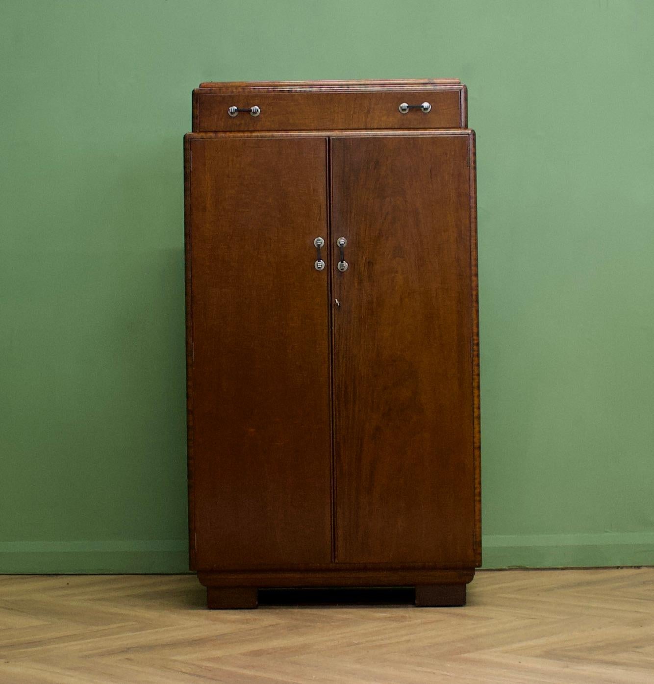 A vintage mahogany Art Deco style compactum / compact wardrobe
Inside is fitted out with a  rail and shelves


 