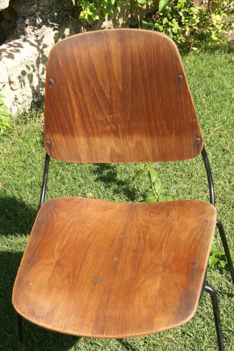Très rare chaise de collection des années 1950 conçue par Augusto Bozzi pour Saporiti.

Mesure cm. 87 de hauteur, cm. 51 de profondeur et cm. 47 de large, conditions de conservation plus que bonnes.
 