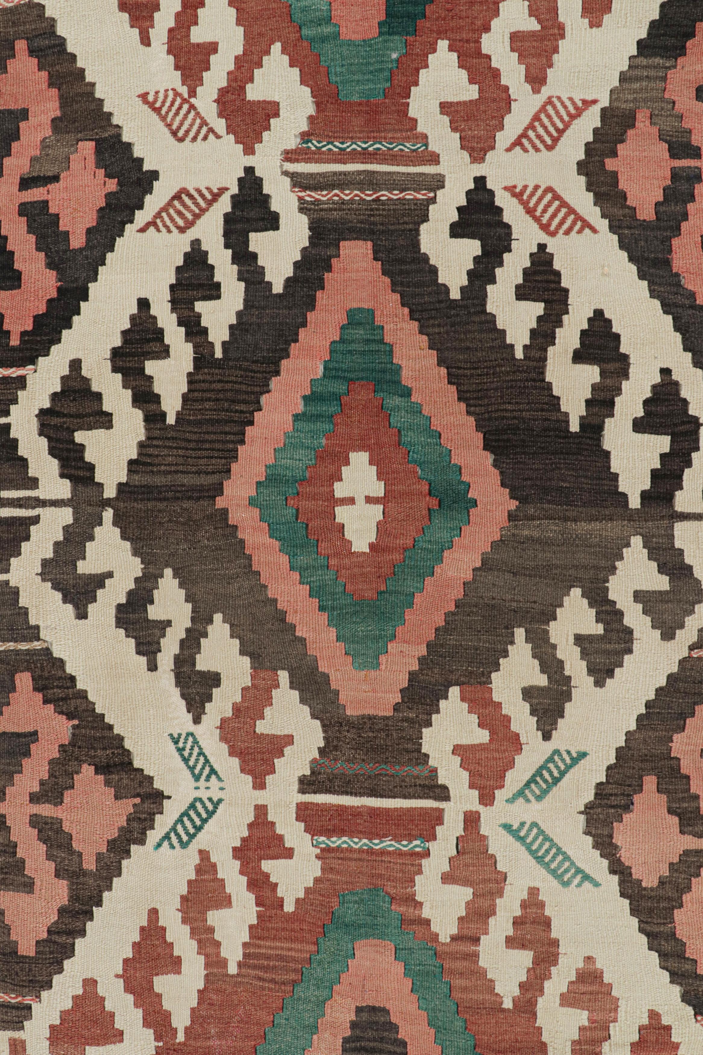 Turkish Midcentury Vintage Kilim Rug in Beige Tribal Geometric Pattern by Rug & Kilim For Sale