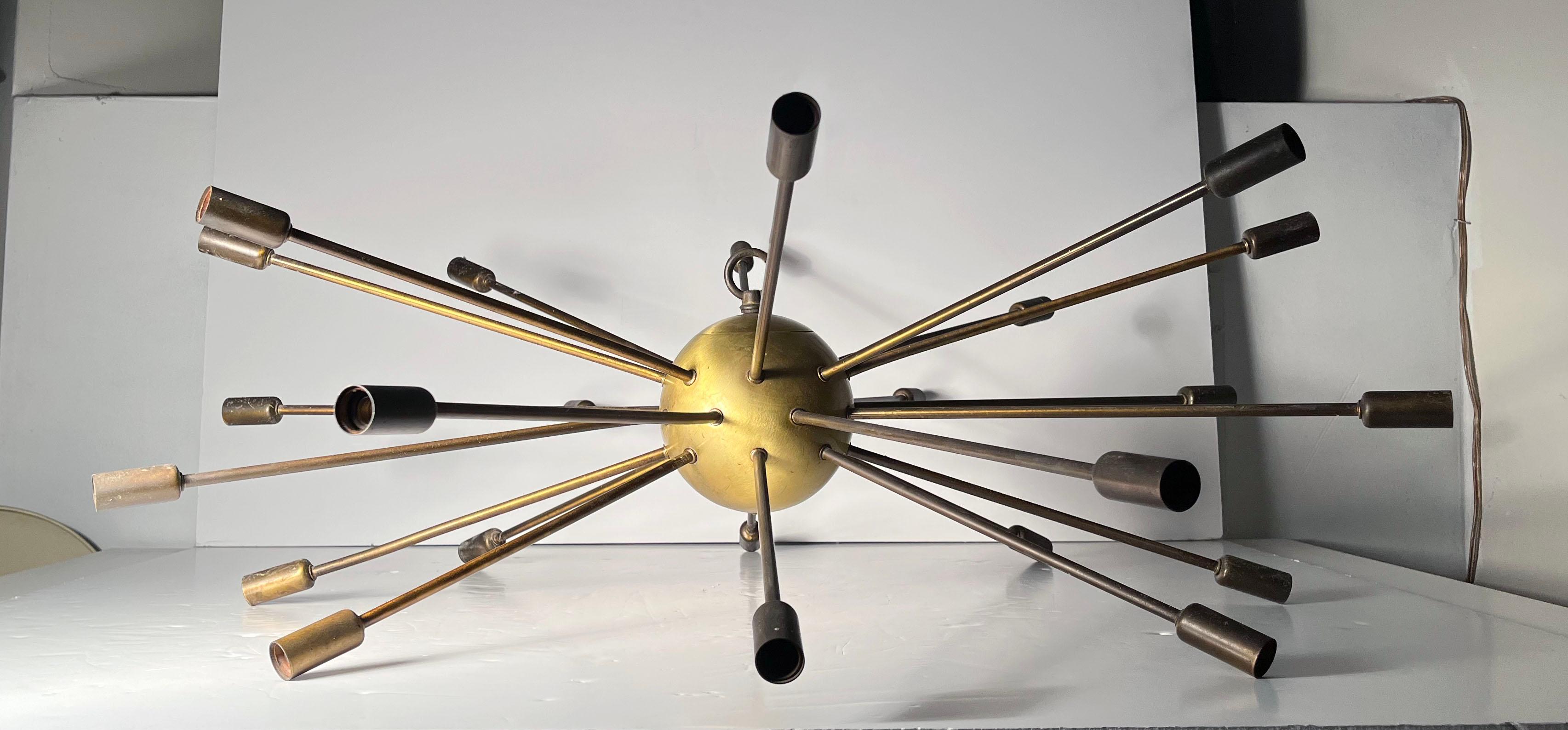 A great period example of a Midcentury Large Sputnik Chandelier. Not a reproduction. Uncertain to maker and origin. Possibly Italian. 

All original wiring. Will need to have inspected and possibly rewired for safety. Some wires to socket cut.

Some
