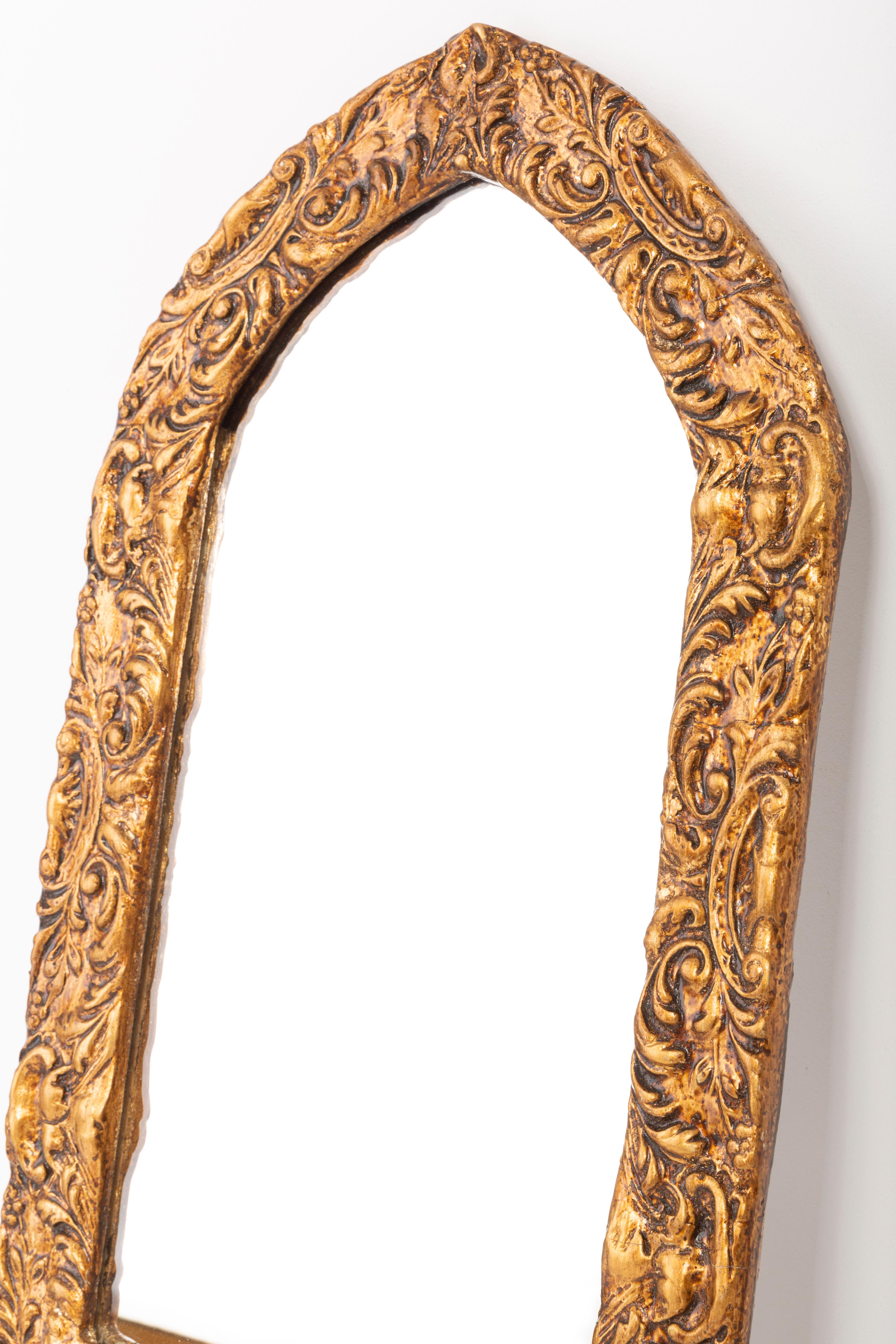 gold mirror with flowers