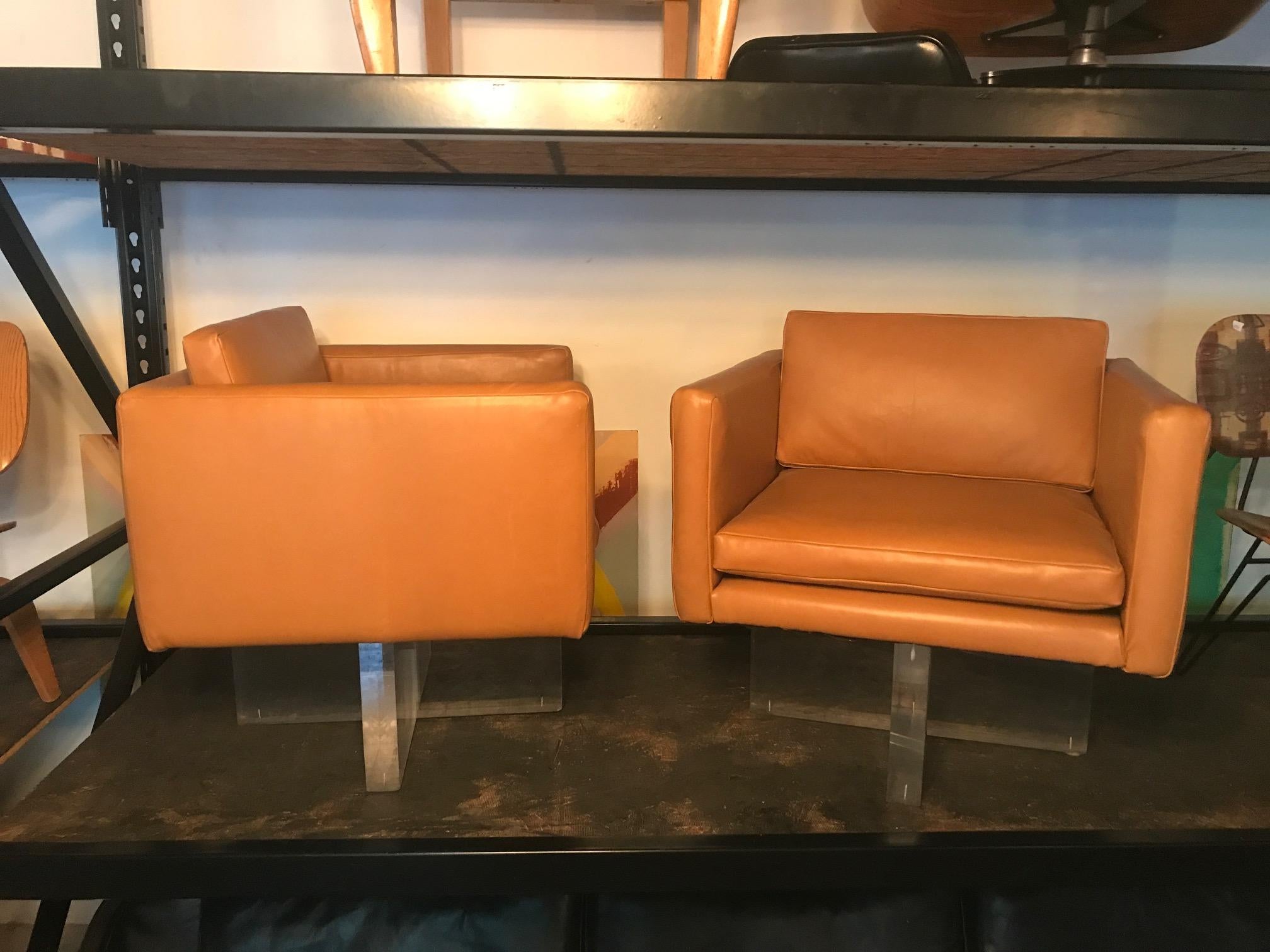 Midcentury vintage pair of leather and Lucite club chairs, great condition.